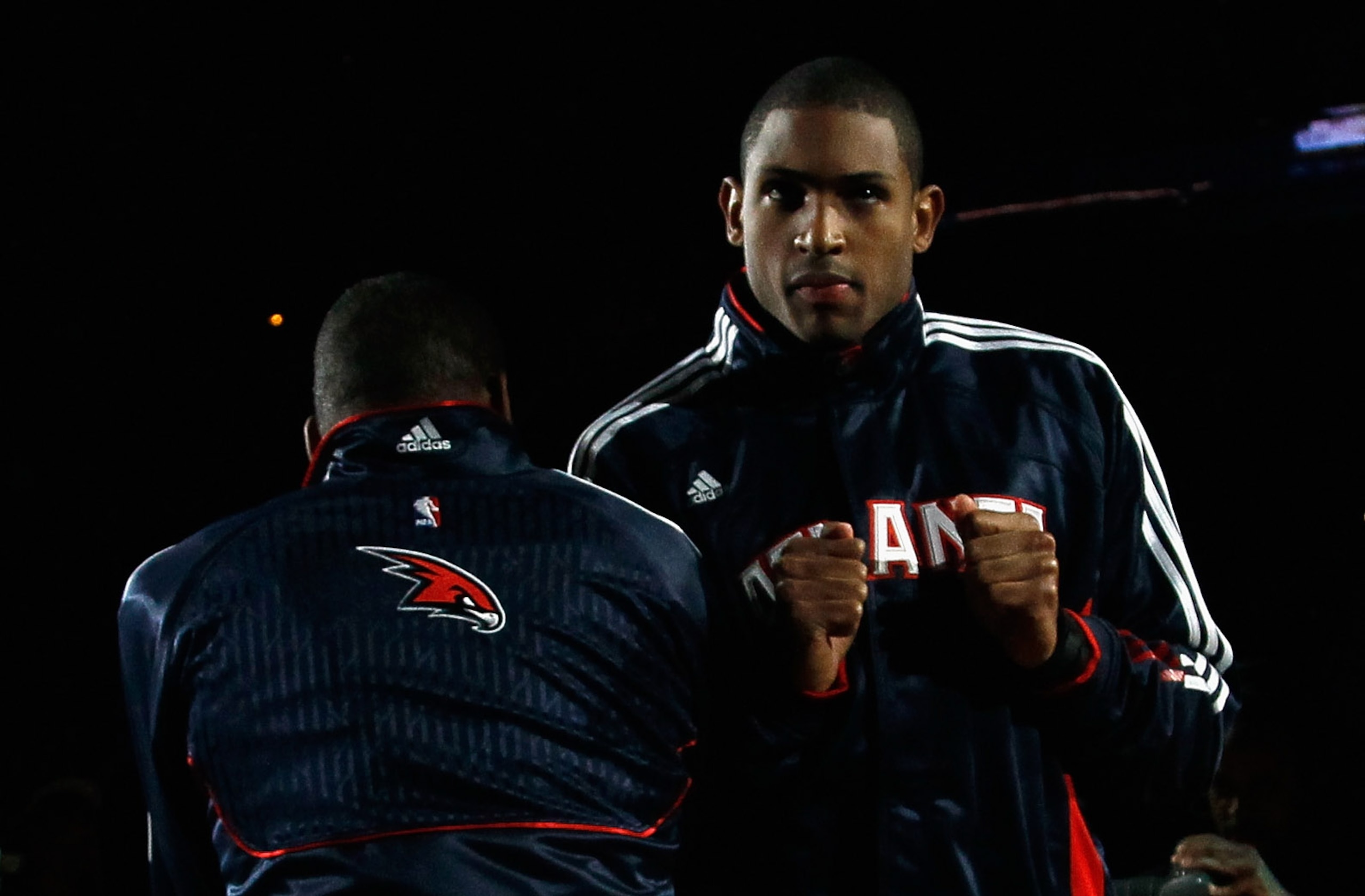 ATLANTA, GA - DECEMBER 11:  Josh Powell #12 and Al Horford #15 of the Atlanta Hawks against the Indiana Pacers at Philips Arena on December 11, 2010 in Atlanta, Georgia.  NOTE TO USER: User expressly acknowledges and agrees that, by downloading and/or usi