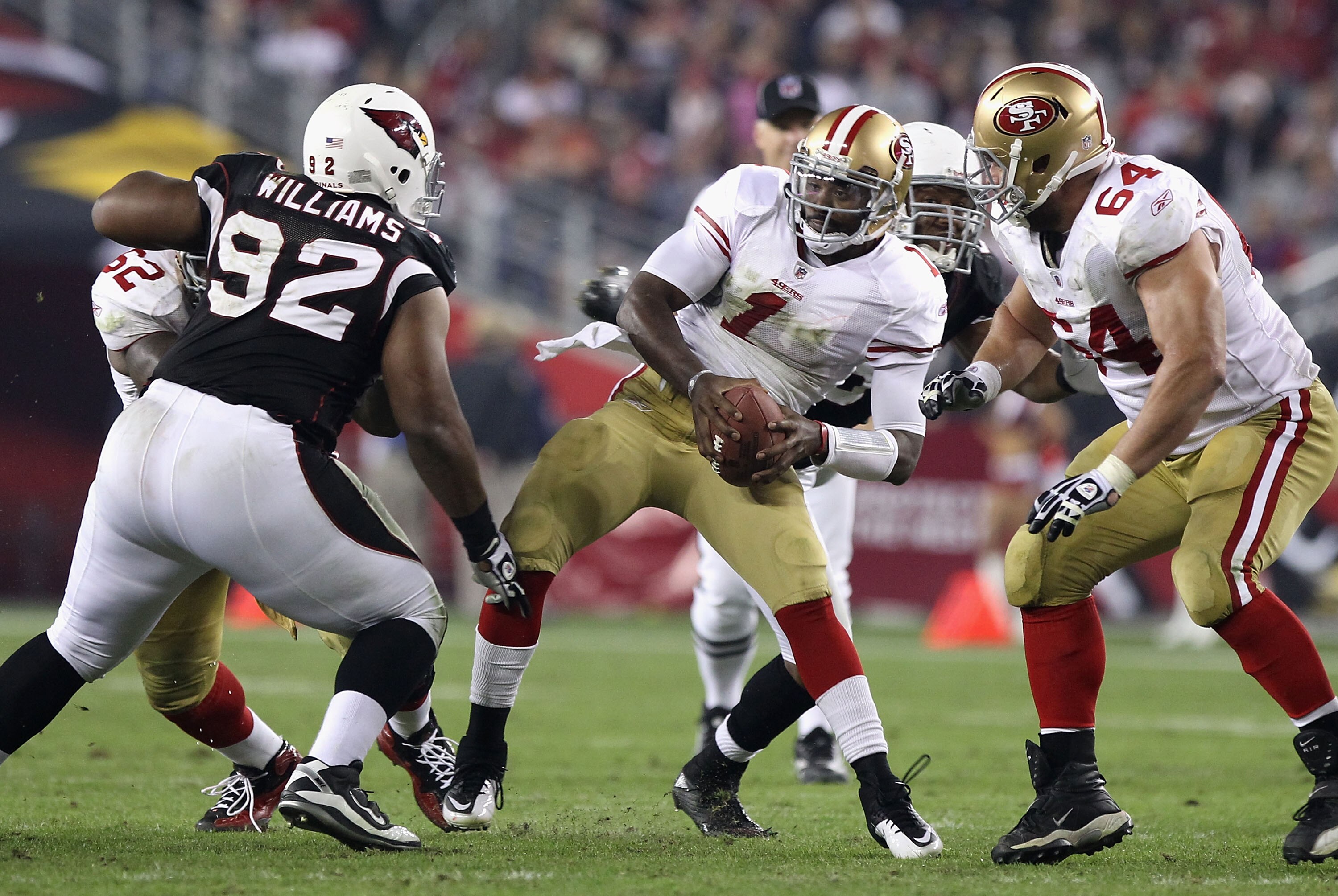 GLENDALE, AZ - NOVEMBER 29:  Quarterback Troy Smith #1 of the San Francisco 49ers is sacked during the NFL game against the Arizona Cardinals at the University of Phoenix Stadium on November 29, 2010 in Glendale, Arizona. The 49ers defeated the Cardinals