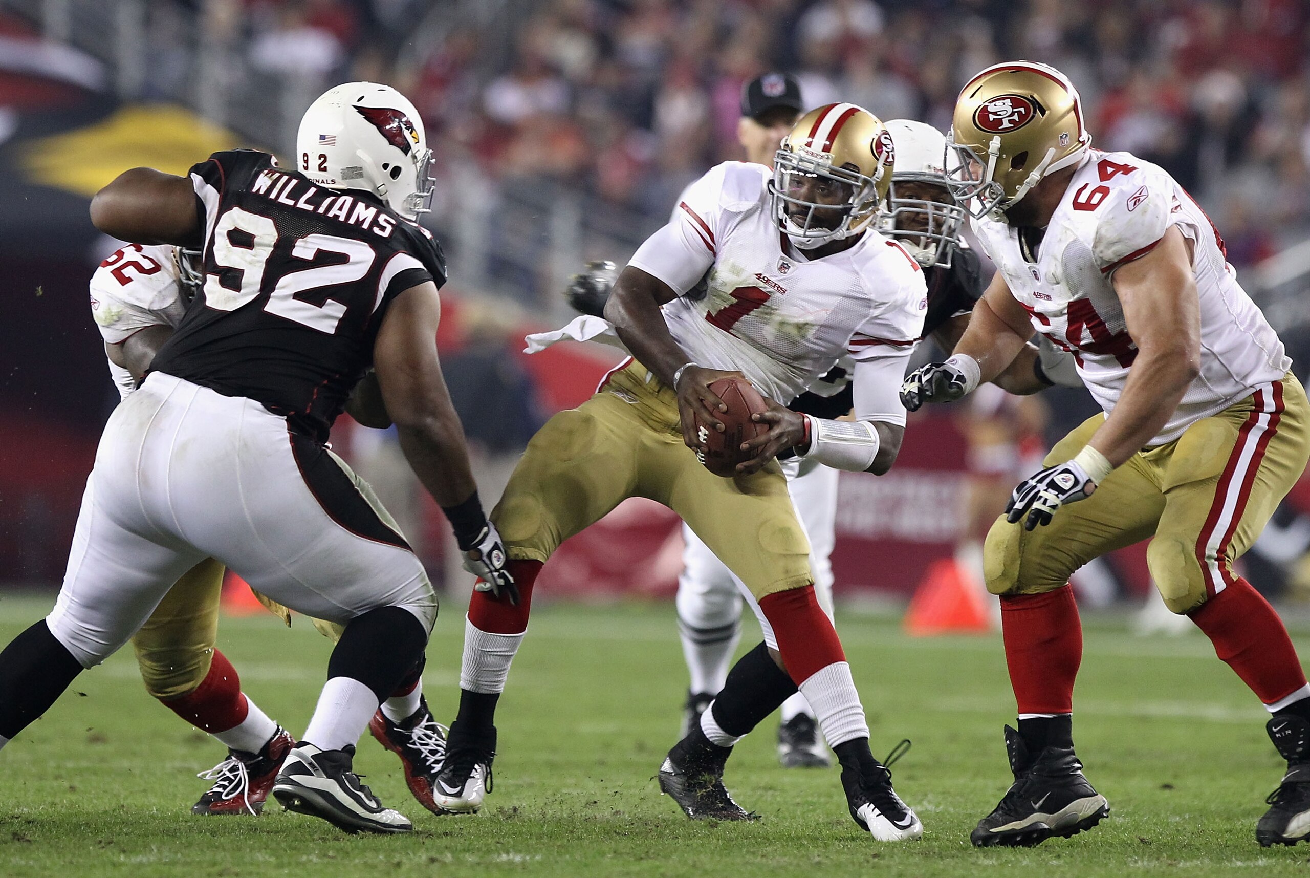 GLENDALE, AZ - NOVEMBER 29: Quarterback Troy Smith #1 of the San Francisco 49ers is sacked during the NFL game against the Arizona Cardinals at the University of Phoenix Stadium on November 29, 2010 in Glendale, Arizona. The 49ers defeated the Cardinals GLENDALE, AZ - NOVEMBER 29: Quarterback Troy Smith #1 of the San Francisco 49ers is sacked during the NFL game against the Arizona Cardinals at the University of Phoenix Stadium on November 29, 2010 in Glendale, Arizona. The 49ers defeated the Cardinals