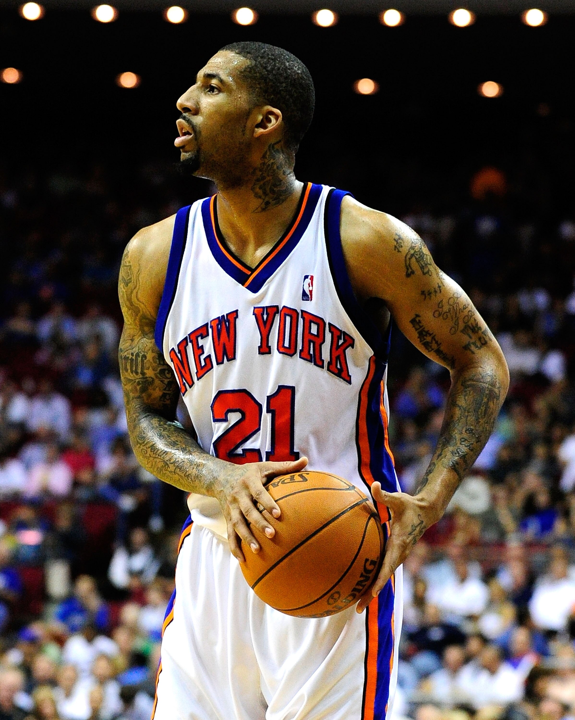 ORLANDO, FL - DECEMBER 02:  Wilson Chandler #21 of the New York Knicks sets up a play during the game against the Orlando Magic at Amway Arena on December 2, 2009 in Orlando, Florida.  NOTE TO USER: User expressly acknowledges and agrees that, by download