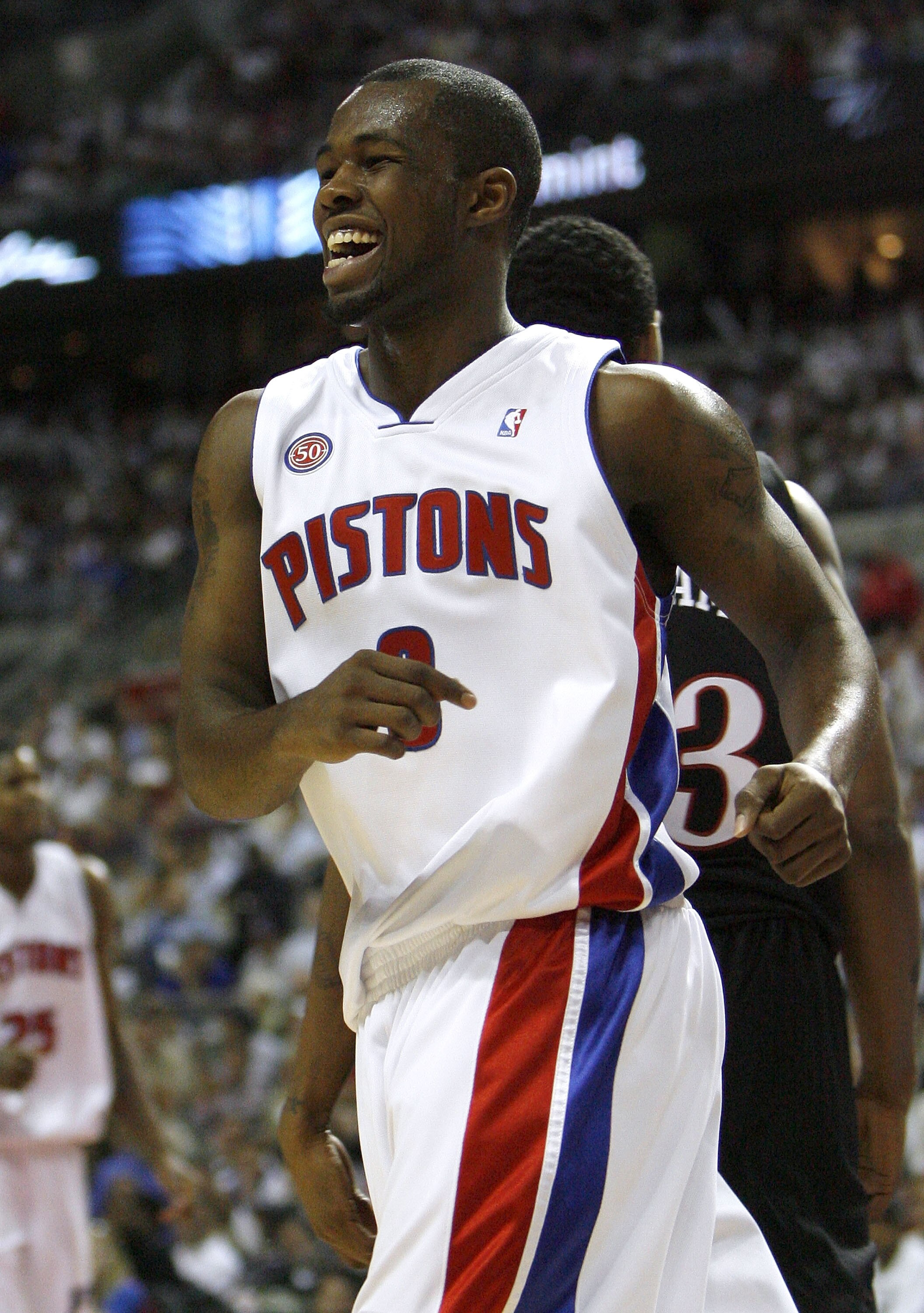 AUBURN HILLS, MI - APRIL 23:  Rodney Stuckey #3 of the Detroit Pistons smiles after a fourth quarter basket against the Philadelphia 76ers in Game Two of the Eastern Conference Quarterfinals during the 2008 NBA Playoffs at the Palace of Auburn Hills on Ap