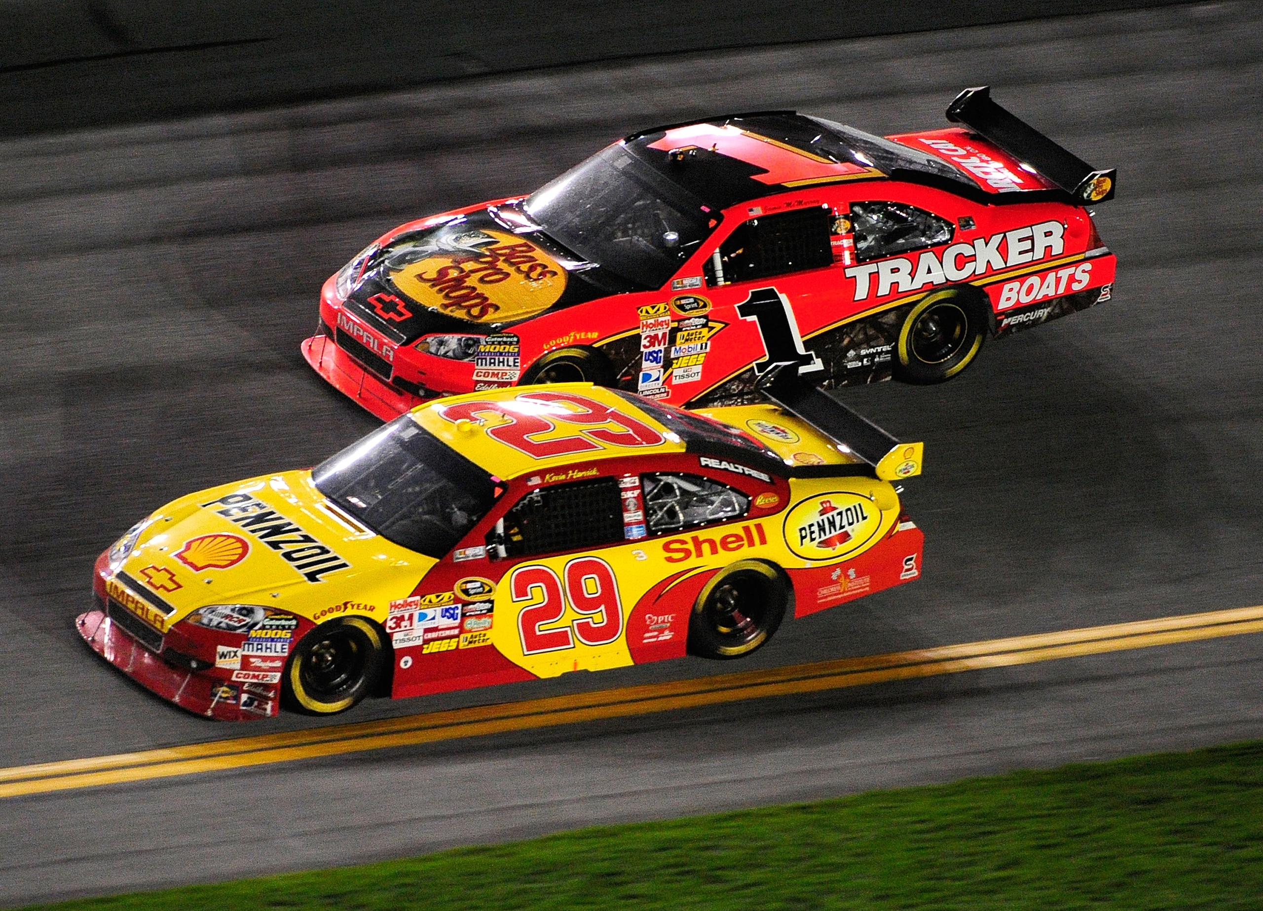 DAYTONA BEACH, FL - FEBRUARY 06: Kevin Harvick, driver of the #29 Shell/Pennzoil Chevrolet, races Jamie McMurray, driver of the #Bass Pro Shops/Tracker Chevrolet, during the Budweiser Shootout at Daytona International Speedway on February 6, 2010 in Dayt DAYTONA BEACH, FL - FEBRUARY 06: Kevin Harvick, driver of the #29 Shell/Pennzoil Chevrolet, races Jamie McMurray, driver of the #Bass Pro Shops/Tracker Chevrolet, during the Budweiser Shootout at Daytona International Speedway on February 6, 2010 in Dayt