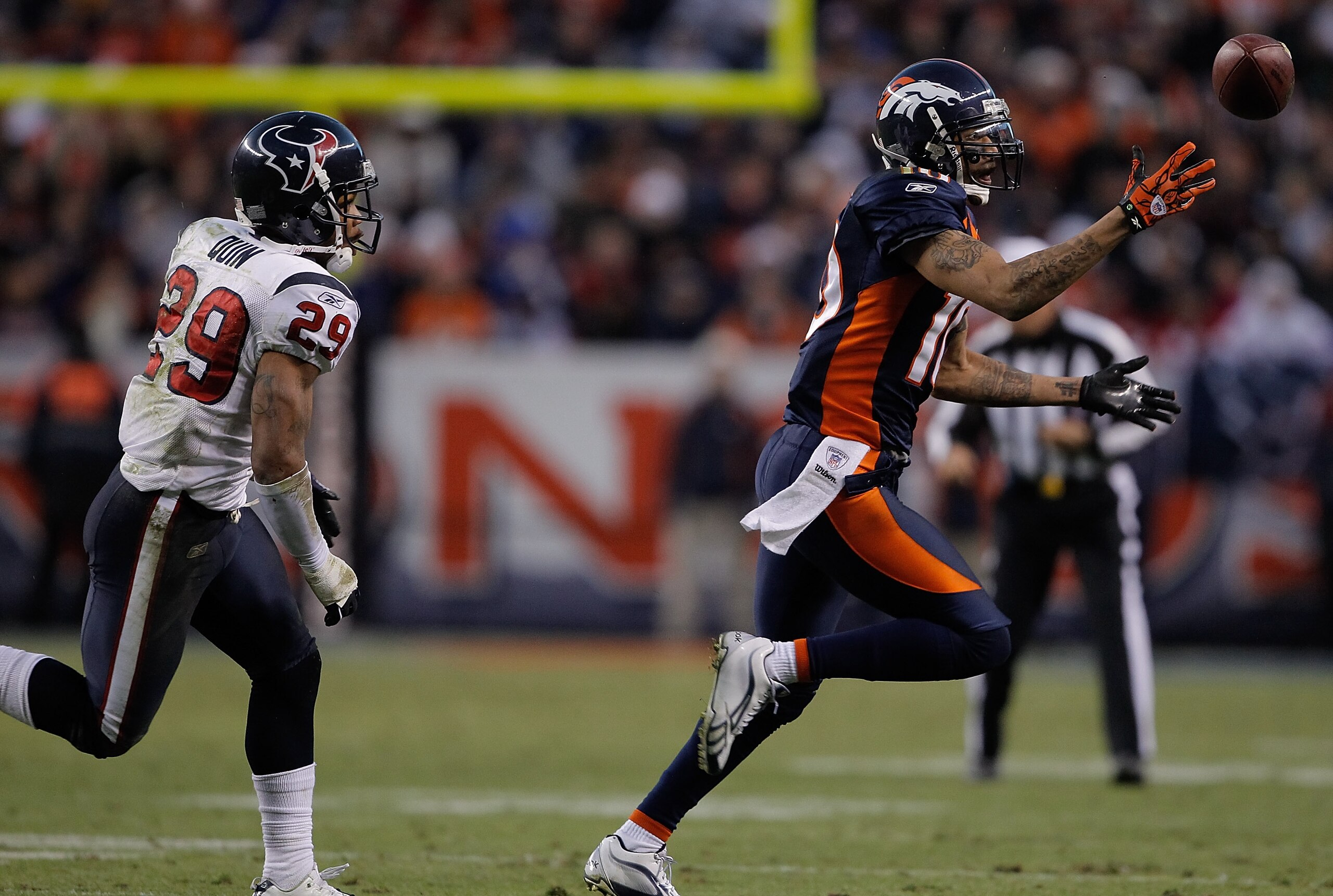 DENVER - DECEMBER 26:  Wide receiver Jabar Gaffney #10 of the Denver Broncos makes a one-handed catch against corner back Glover Quin #29 of the Houston Texans during the fourth quarter at INVESCO Field at Mile High on December 26, 2010 in Denver, Colorad