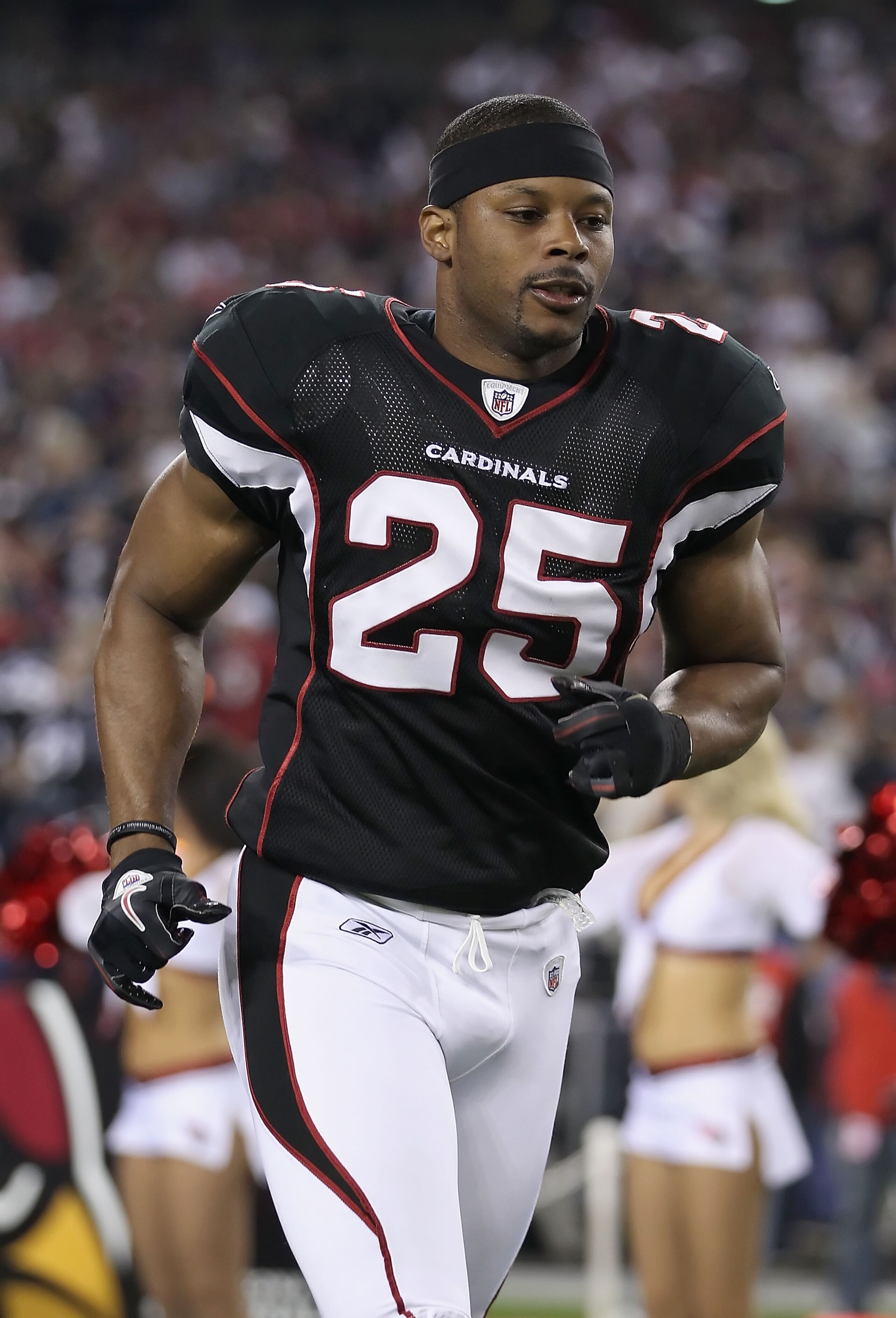 GLENDALE, AZ - NOVEMBER 29:  Safety Kerry Rhodes #25 of the Arizona Cardinals is introduced before the NFL game against the San Francisco 49ers at the University of Phoenix Stadium on November 29, 2010 in Glendale, Arizona.  The 49ers defeated the Cardina