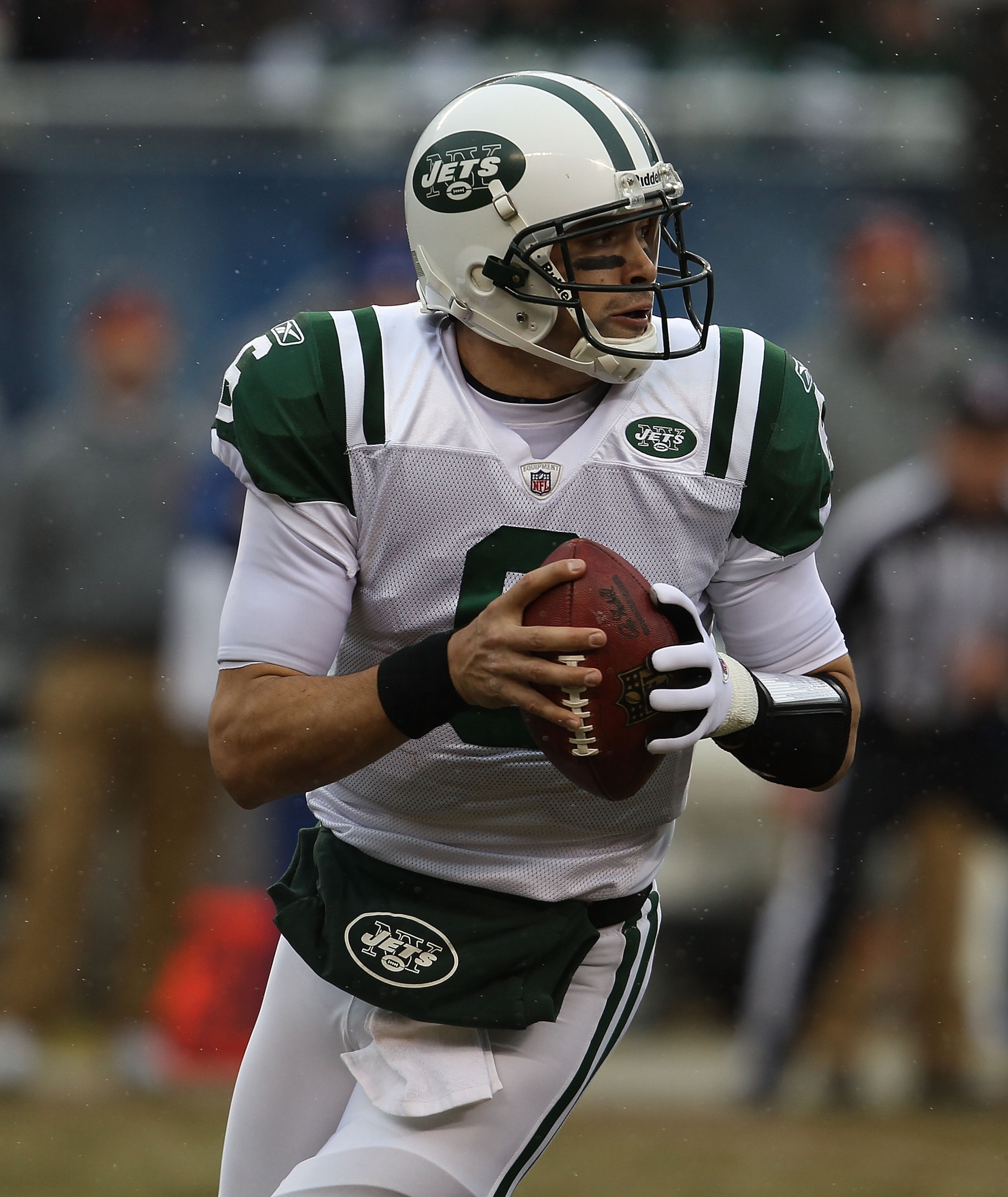 CHICAGO, IL - DECEMBER 26: Mark Sanchez #6 of the New York Jets rolls out to look for a receiver against the Chicago Bears at Soldier Field on December 26, 2010 in Chicago, Illinois. The Bears defeated the Jets 38-34. (Photo by Jonathan Daniel/Getty Image