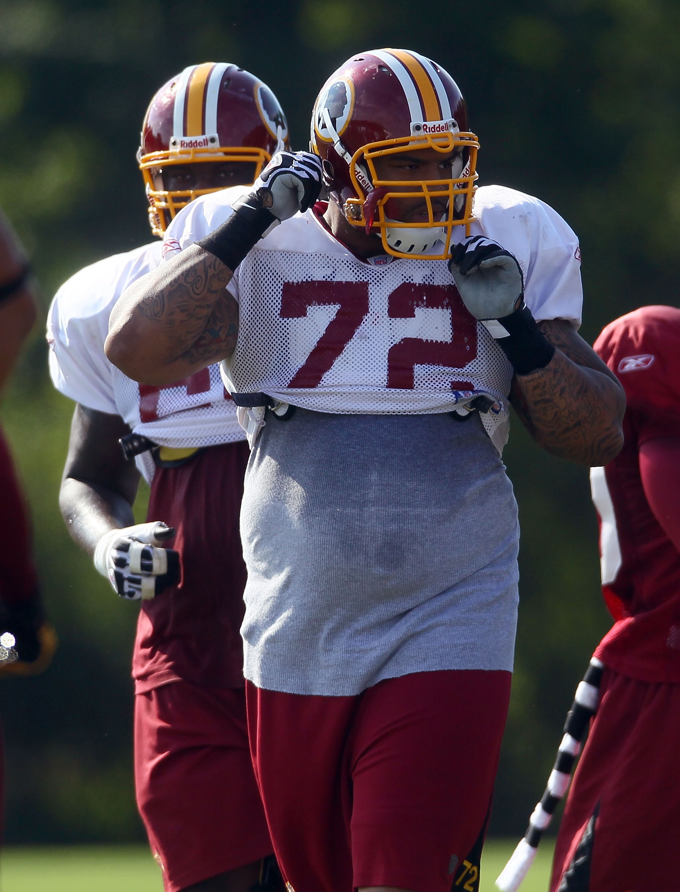 ASHBURN, VA - JULY 30:  Rookie offensive tackle Trent Williams #72 of the Washington Redskins works out during drills on the second day of training camp July 30, 2010 in Ashburn, Virginia. Williams signed his contract with the team early this morning.  (P