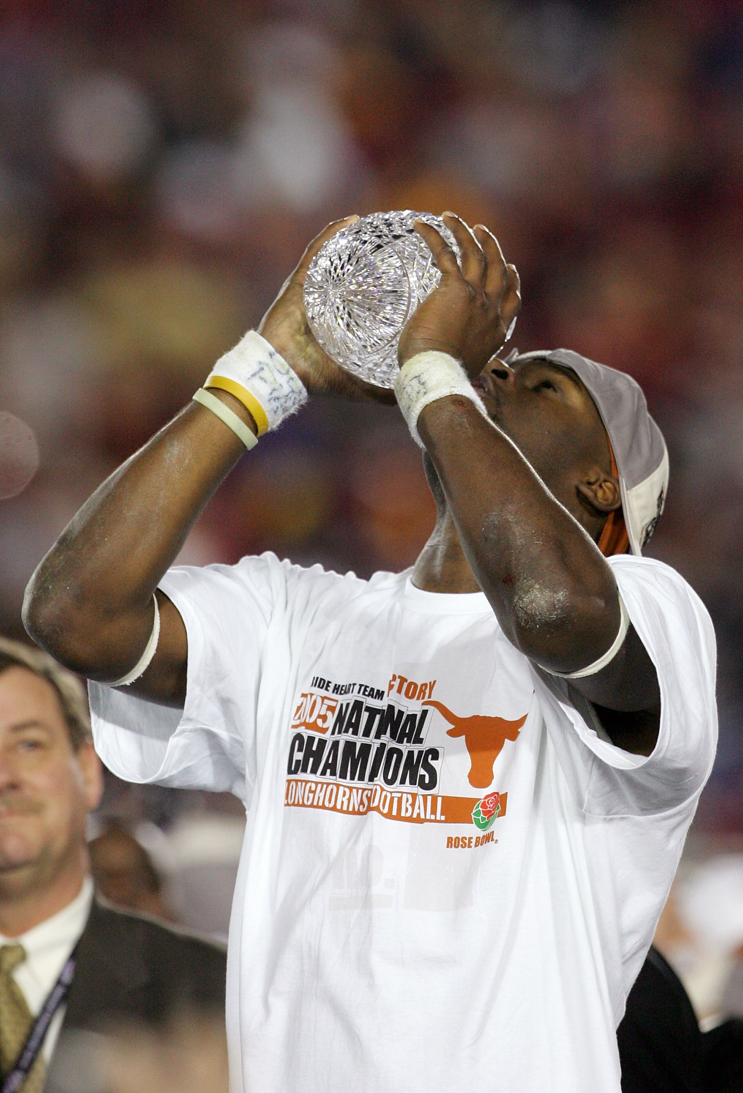 PASADENA, CA - JANUARY 04:  Quarterback Vince Young #10 of the Texas Longhorns kisses the championship trophy after defeating the USC Trojans in the final moments of the BCS National Championship Rose Bowl Game at the Rose Bowl on January 4, 2006 in Pasad