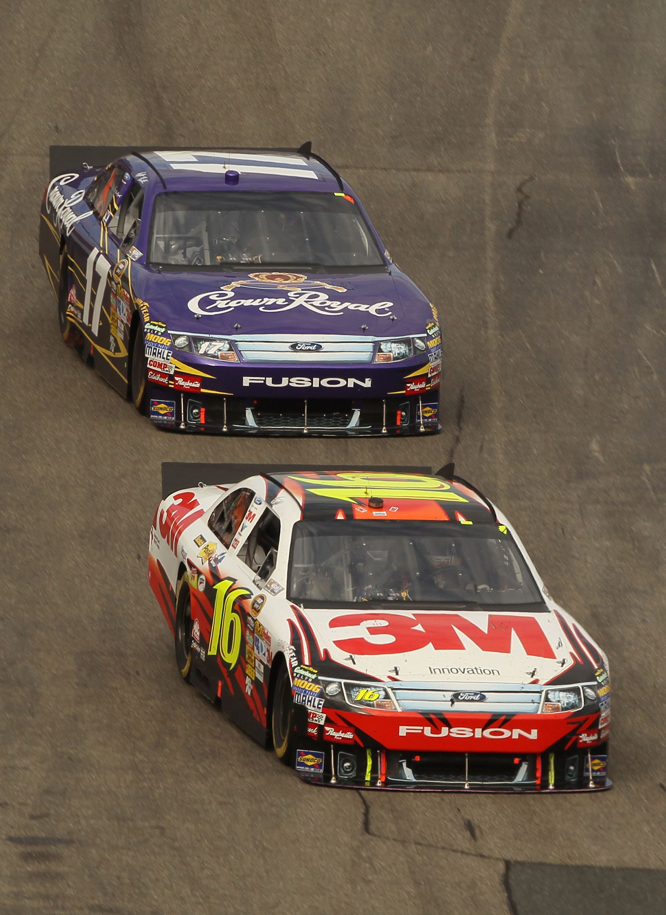 LOUDON, NH - SEPTEMBER 19:  Greg Biffle, driver of the #16 3M Ford races with Matt Kenseth, driver of the #17 Crown Royal Ford during the NASCAR Sprint Cup Series Sylvania 300 at New Hampshire Motor Speedway on September 19, 2010 in Loudon, New Hampshire.