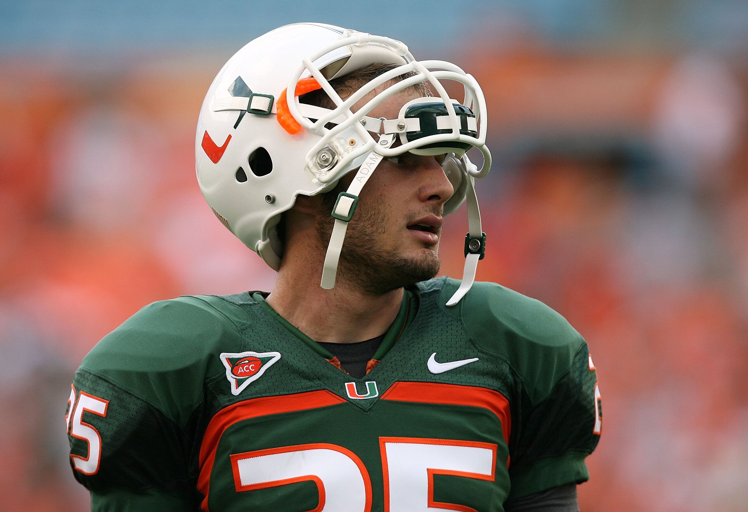 MIAMI - OCTOBER 25:  Place kicker Matt Bosher #25 of the Miami Hurricanes takes  a moment before being called on to kick a field goal against the Wake Forest Demon Decons at Dolphin Stadium on October 25, 2008 in Miami, Florida. Miami defeated Wake Forest