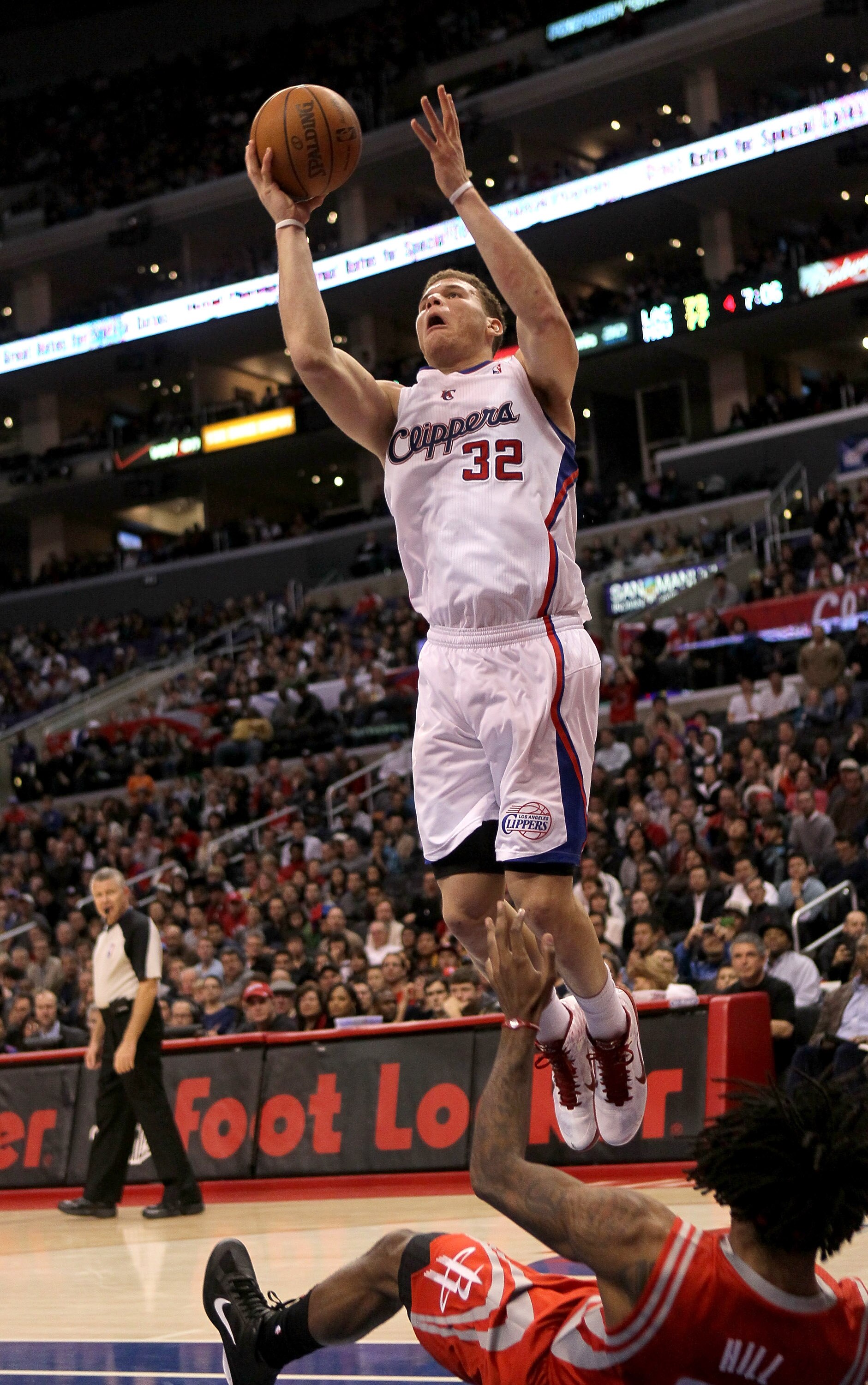 LOS ANGELES, CA - DECEMBER 22:  Blake Griffin #32 of the Los Angeles Clippers shoots over Jordan Hill #27 of the Houston Rockets at Staples Center on December 22, 2010 in Los Angeles, California.  The Rockets won 97-92. NOTE TO USER: User expressly acknow