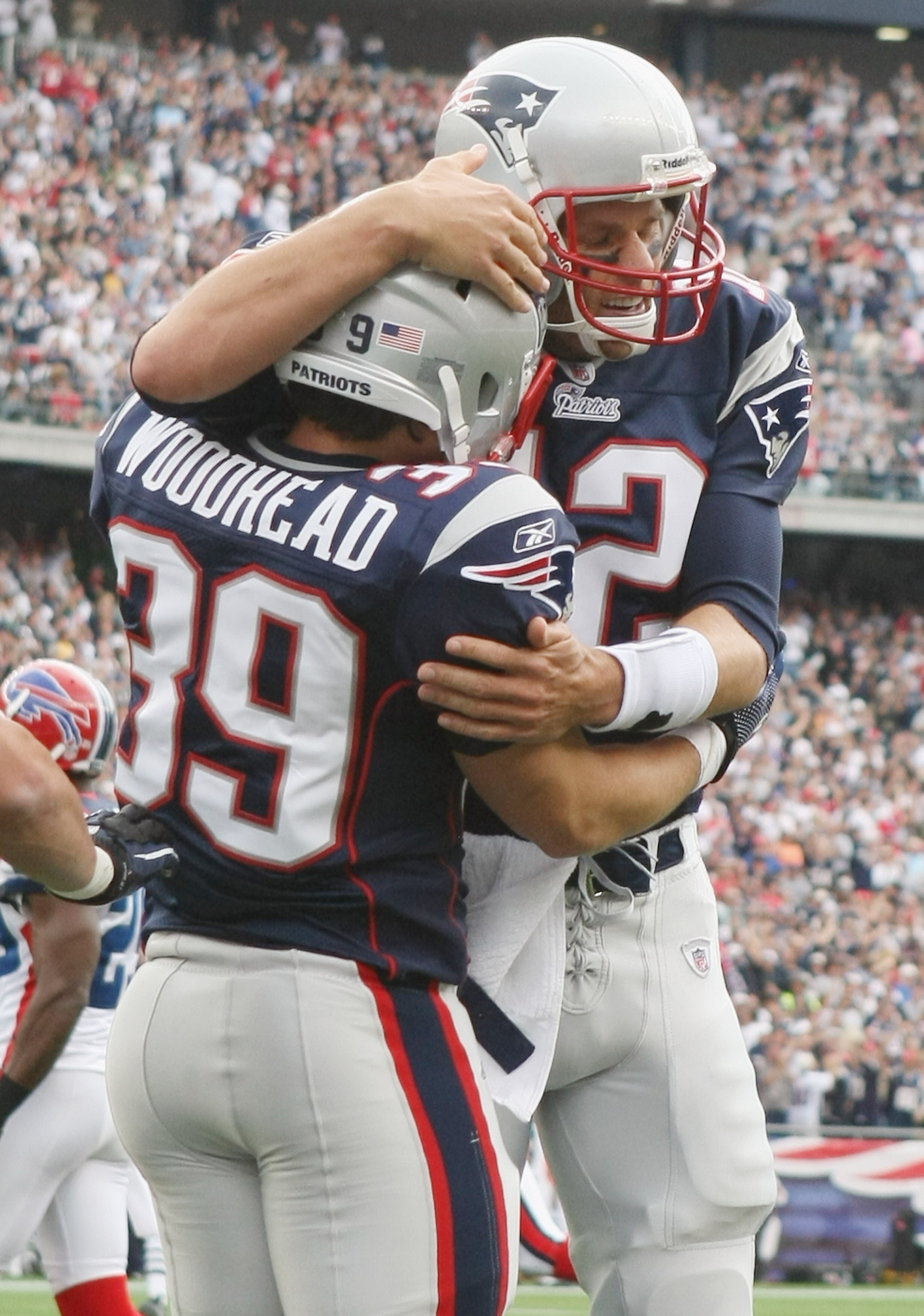 FOXBORO, MA - SEPTEMBER 26:  Danny Woodhead #39 of the New England Patriots is congratulated by teammate Tom Brady #12 after Woodhead ran the ball in for a touchdown in the second quarter against the Buffalo Bills during on September 26, 2010 at Gillette