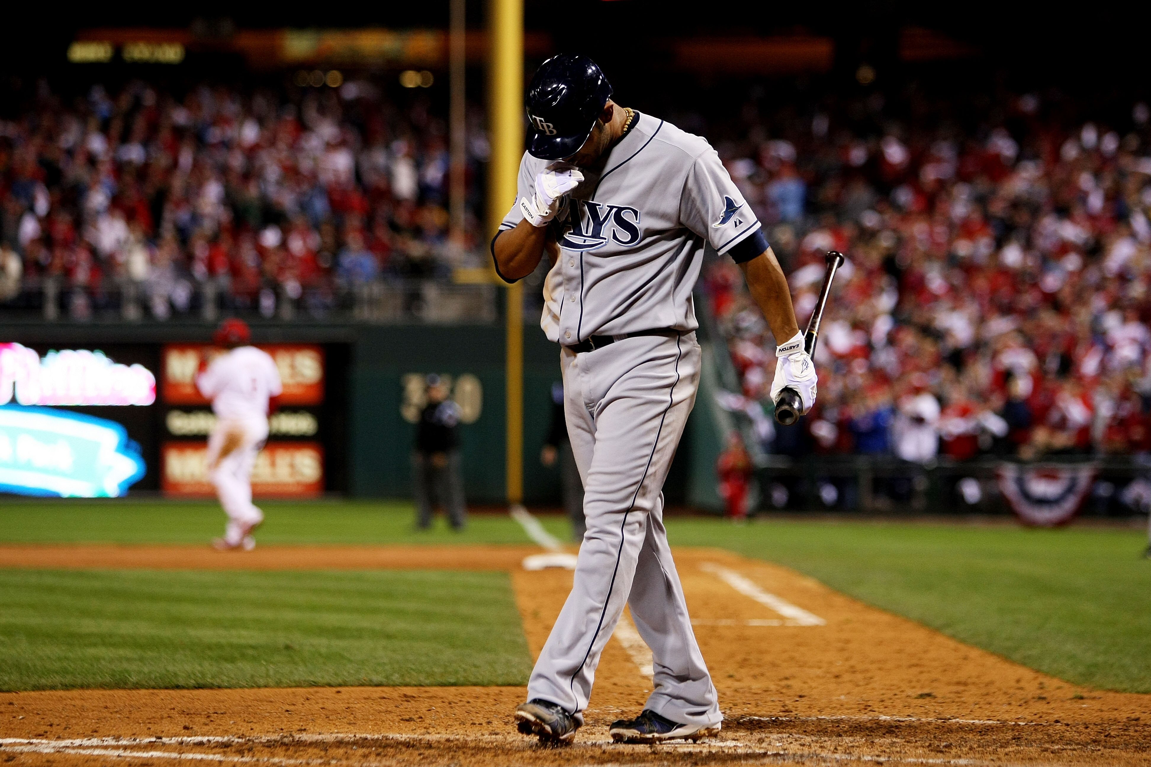 PHILADELPHIA - OCTOBER 26:  Carlos Pena #23 of the Tampa Bay Rays reacts after striking out against the Philadelphia Phillies during game four of the 2008 MLB World Series on October 26, 2008 at Citizens Bank Park in Philadelphia, Pennsylvania.  (Photo by