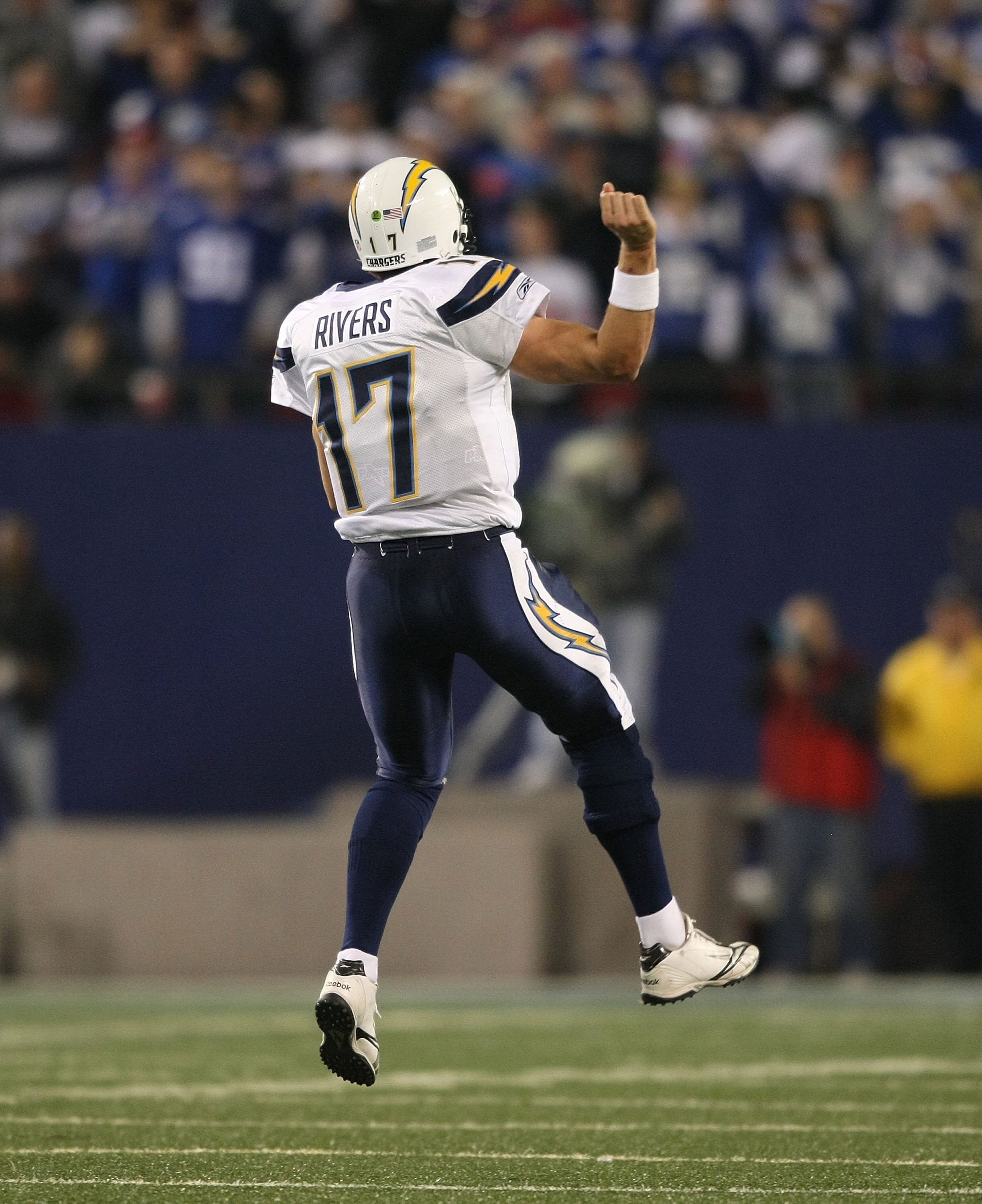 EAST RUTHERFORD, NJ - NOVEMBER 8:  Philip Rivers #17 of the San Diego Chargers celebrates a touchdown against the New York Giants at Giants Stadium on November 8, 2009 in East Rutherford, New Jersey. The Chargers defeated the Giants 21-20.  (Photo by Nick