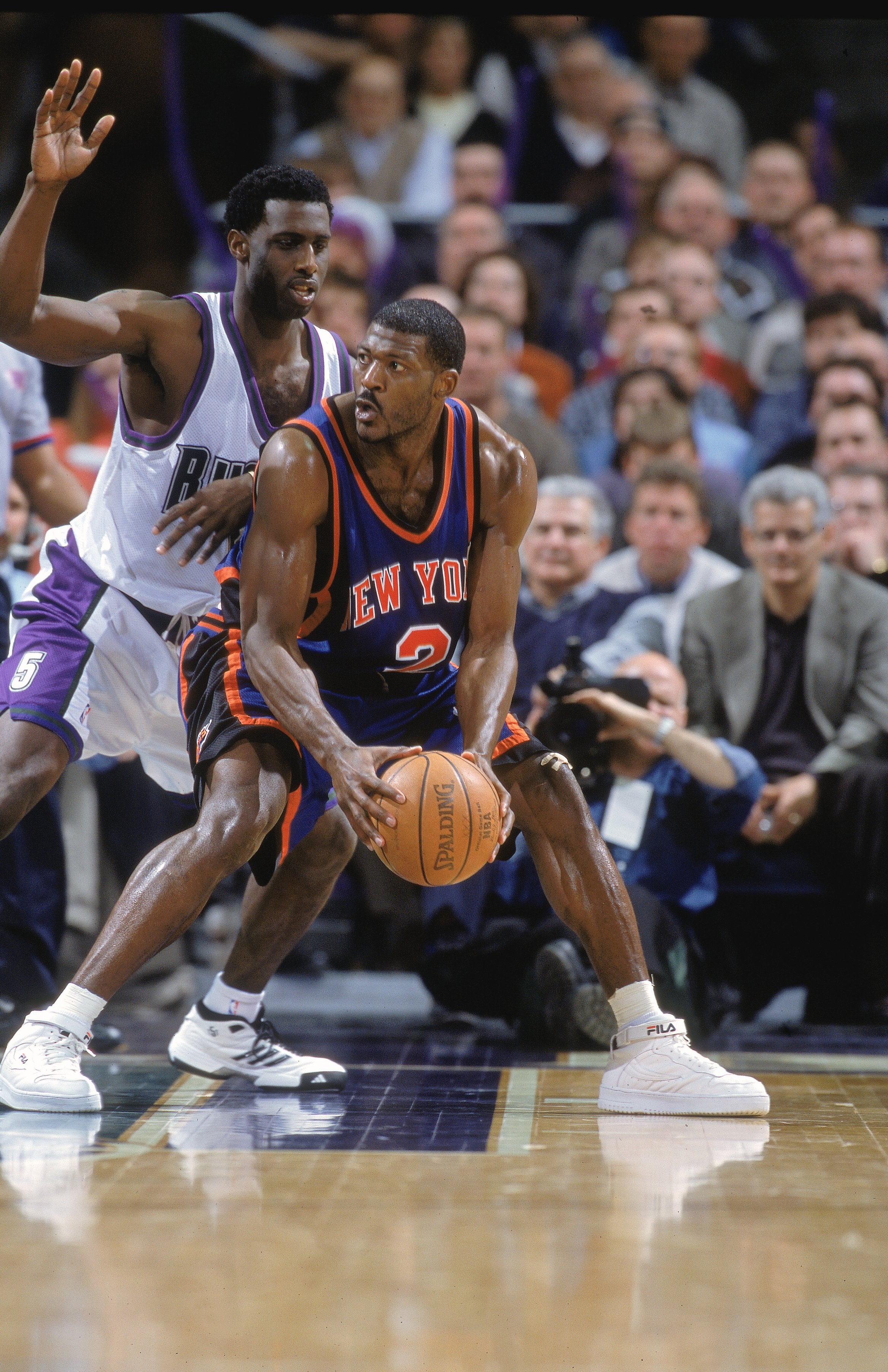 23 Jan 2001:  Larry Johnson #2 of the New York Knicks looks to move the ball as he is guarded by Tim Thomas #5 of the Milwaukee Bucks  at the Bradley Center in Milwaukee, Wisconsin. The Bucks defeated the Knicks 105-91.     NOTE TO USER: It is expressly u