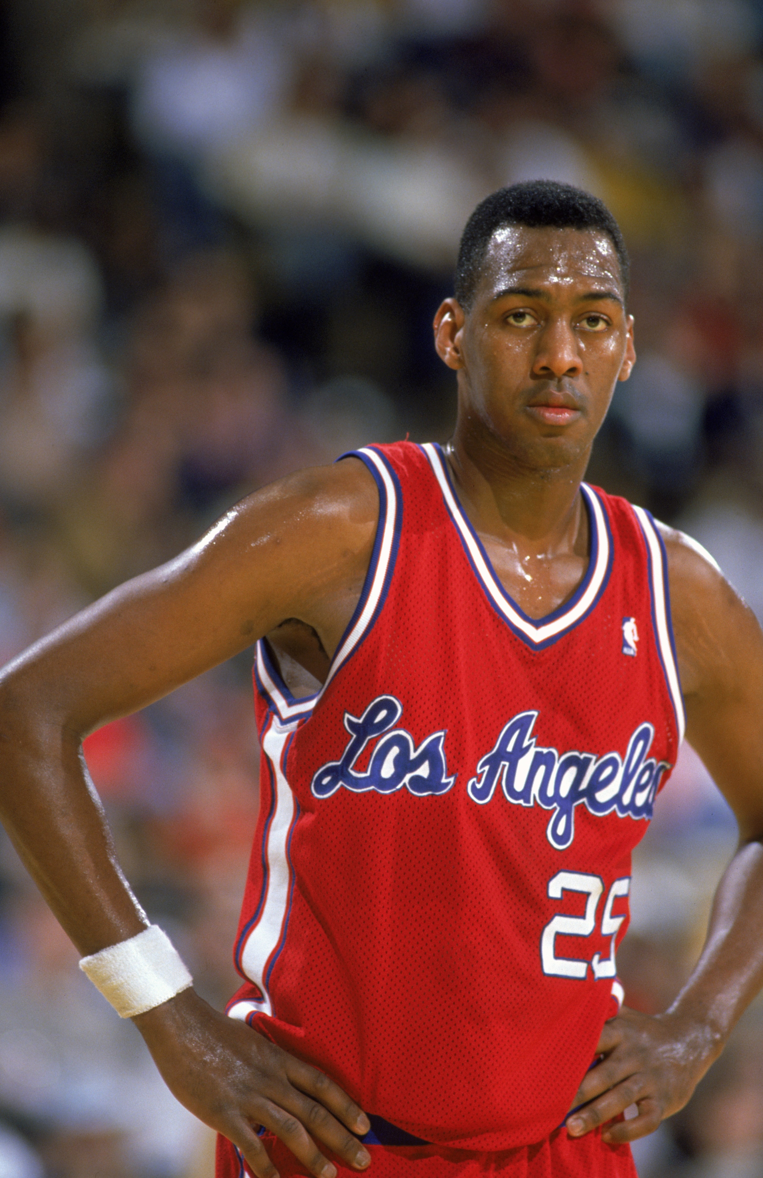 LOS ANGELES - JANUARY 1:  Danny Manning #5 of the Los Angeles Clippers watches the NBA game against the Los Angeles Lakers at the Great Western Forum, in Los Angeles, California on January 1, 1988.  NOTE TO USER: User expressly acknowledges and agrees tha