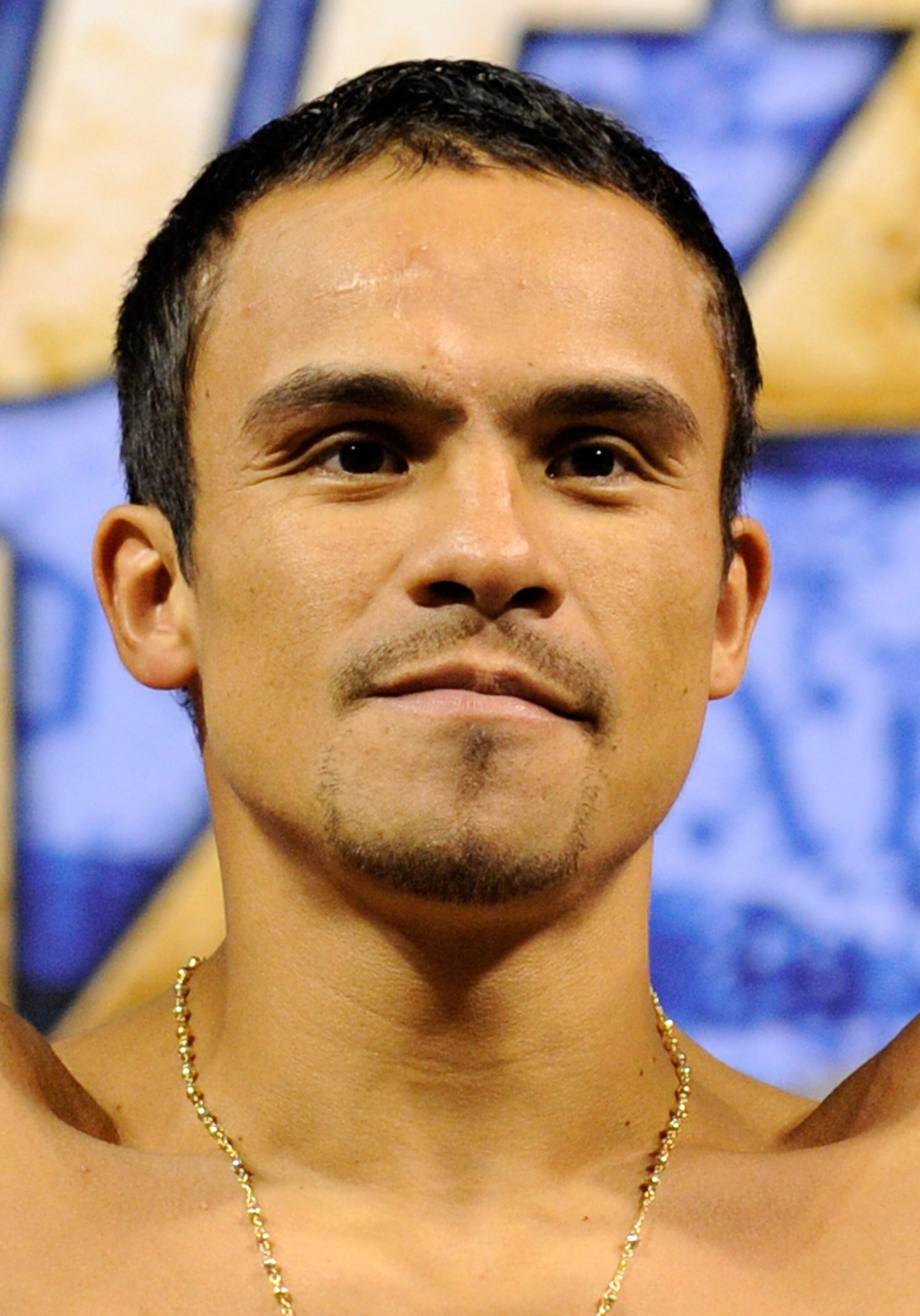 LAS VEGAS - JULY 30: WBA/WBO lightweight champion Juan Manuel Marquez poses on the scale during the official weigh-in for his fight against Juan Diaz at the Mandalay Bay Events Center July 30, 2010 in Las Vegas, Nevada. Marquez will defend his titles aga LAS VEGAS - JULY 30: WBA/WBO lightweight champion Juan Manuel Marquez poses on the scale during the official weigh-in for his fight against Juan Diaz at the Mandalay Bay Events Center July 30, 2010 in Las Vegas, Nevada. Marquez will defend his titles aga
