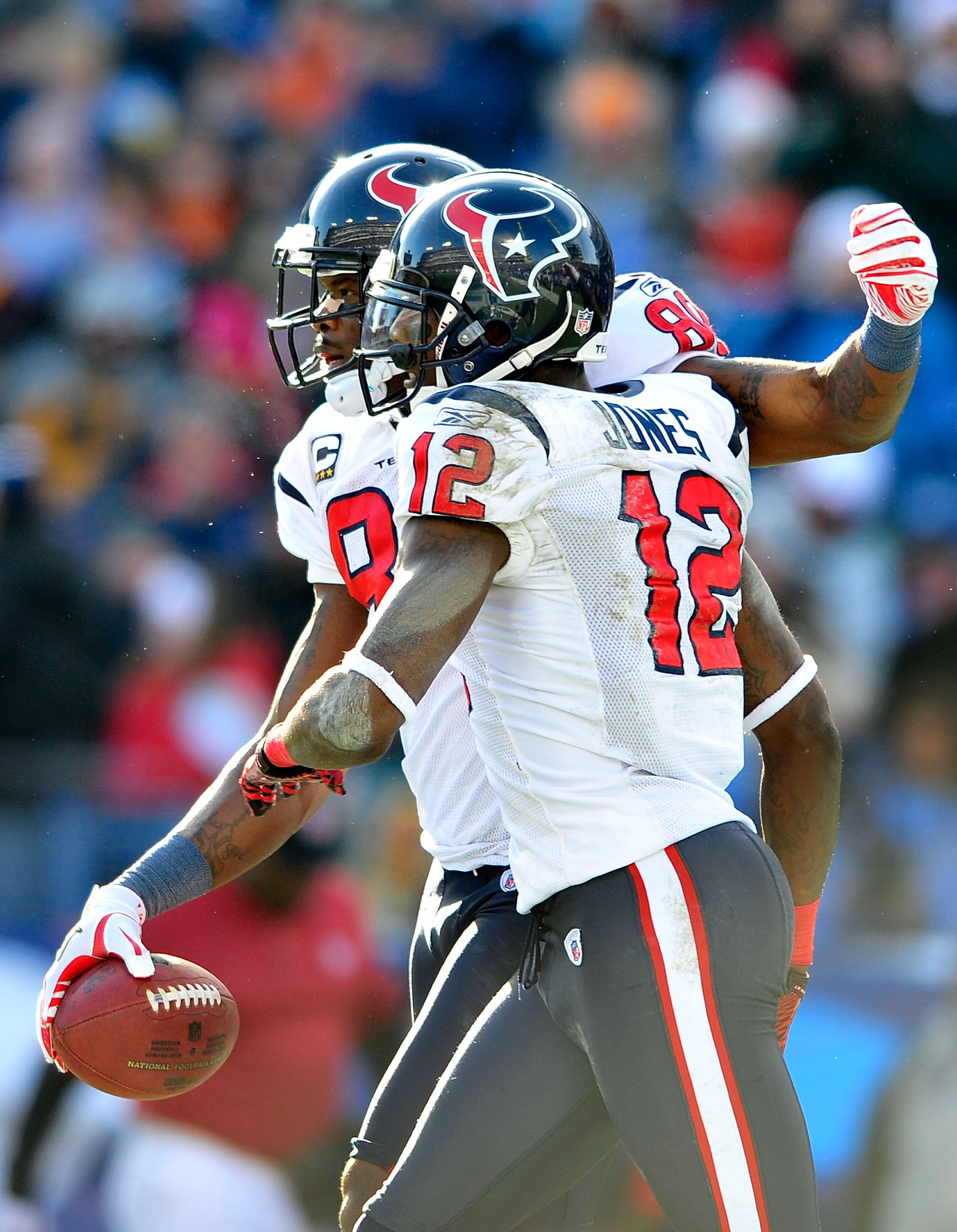 NASHVILLE, TN - DECEMBER 19:  Andre Johnson #80 and Jacoby Jones #12 of the Houston Texans celebrate after Johnson's touchdown against the Tennessee Titans at LP Field on December 19, 2010 in Nashville, Tennessee. The Titans defeated the Texans, 31-17.  (