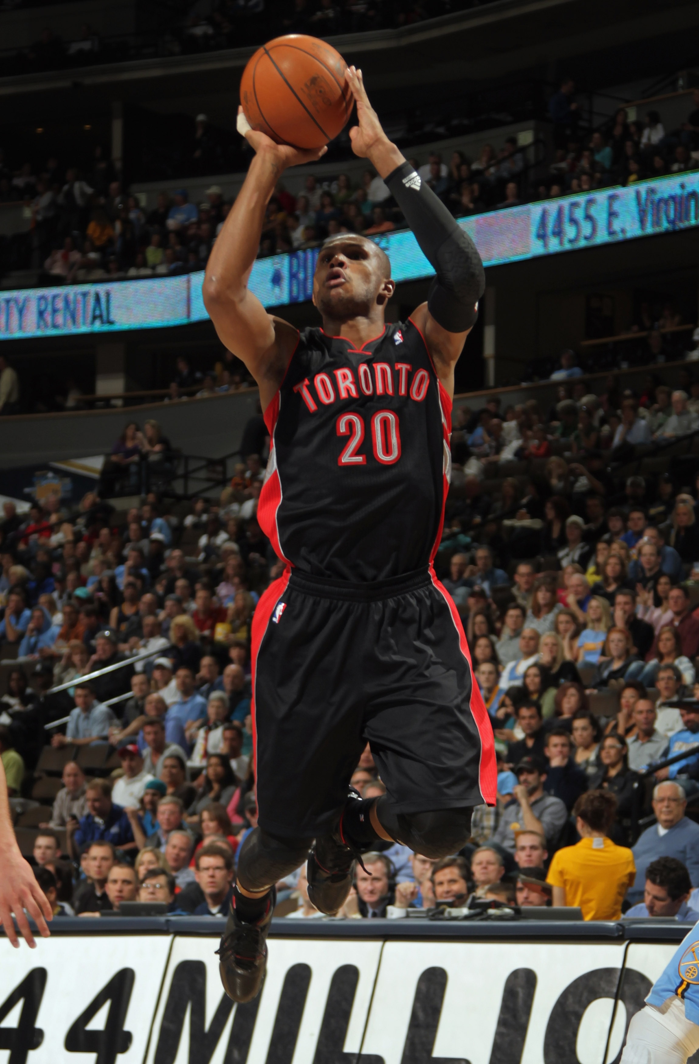 DENVER, CO - MARCH 21:  Leandro Barbosa #20 of the Toronto Raptors takes a shot against the Denver Nuggets at the Pepsi Center on March 21, 2011 in Denver, Colorado. The Nuggets defeated the Raptors 123-90. NOTE TO USER: User expressly acknowledges and ag