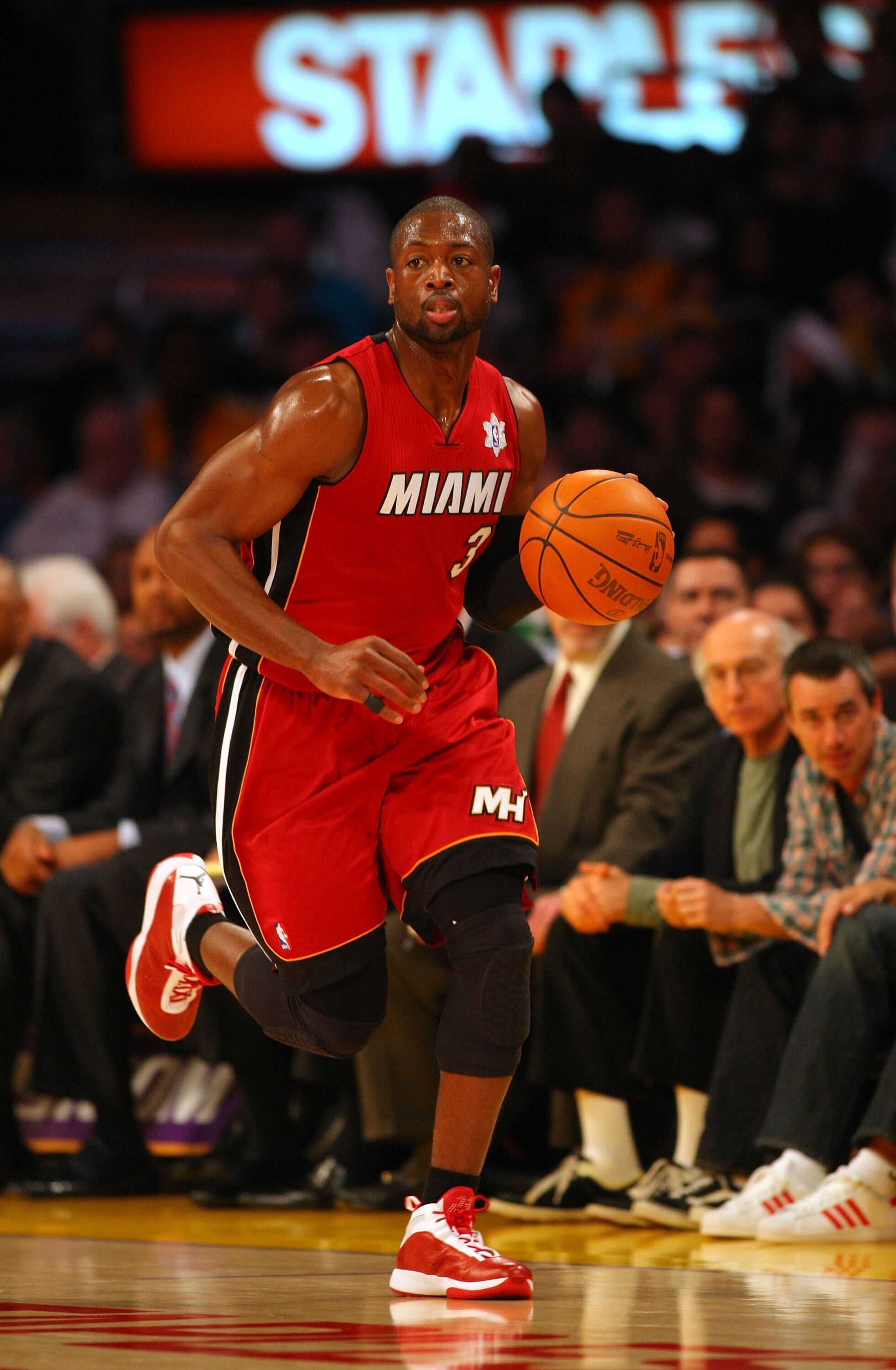 LOS ANGELES, CA - DECEMBER 25:  Dwyane Wade #3 of the Miami Heat dribbles the ball upcourt during the NBA game against the Los Angeles Lakers at Staples Center on December 25, 2010 in Los Angeles, California. The Heat defeated the Lakers 96-80. NOTE TO US