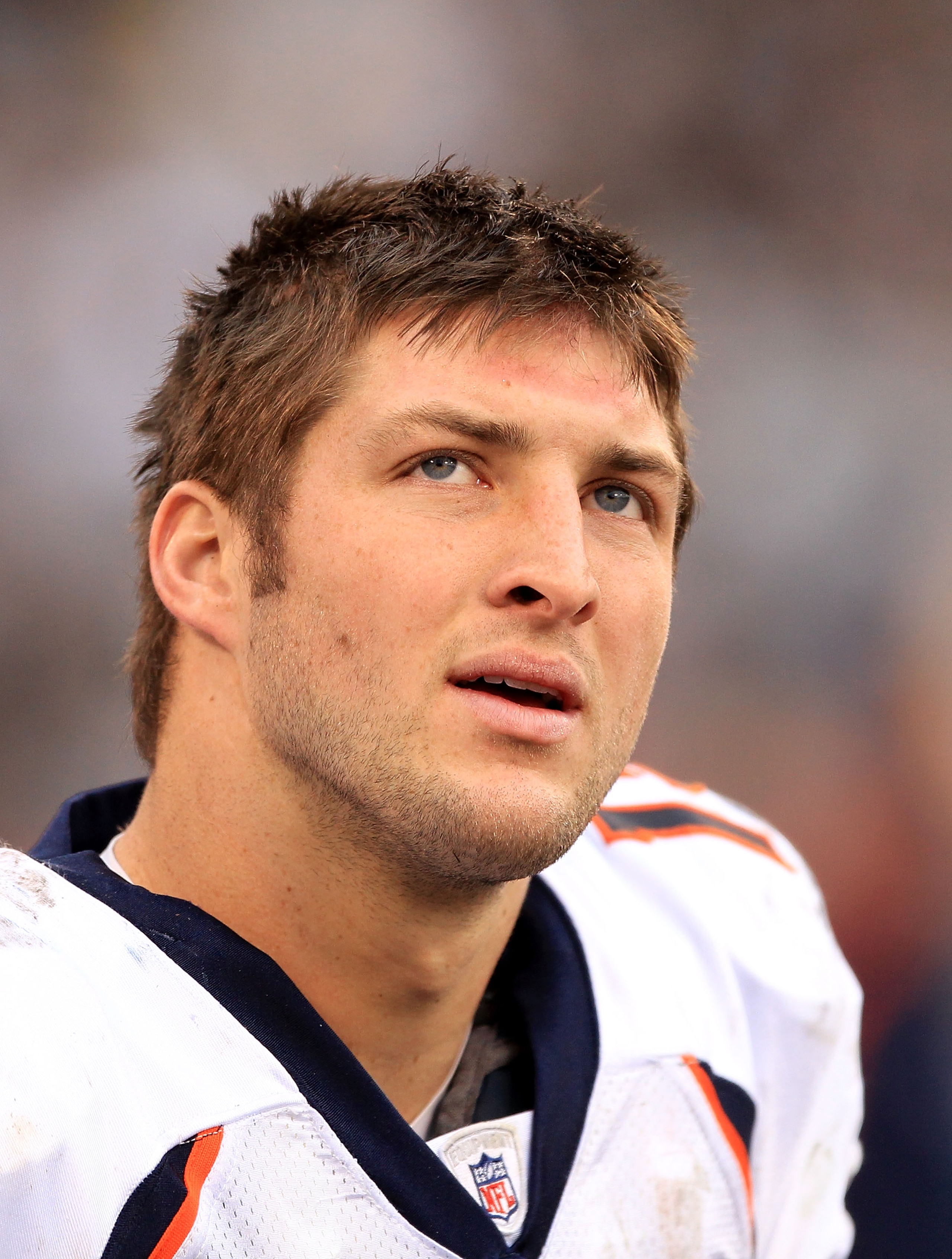 OAKLAND, CA - DECEMBER 19:  Tim Tebow #15 of the Denver Broncos stands on the sideline during their game against the Oakland Raiders at Oakland-Alameda County Coliseum on December 19, 2010 in Oakland, California.  (Photo by Ezra Shaw/Getty Images)