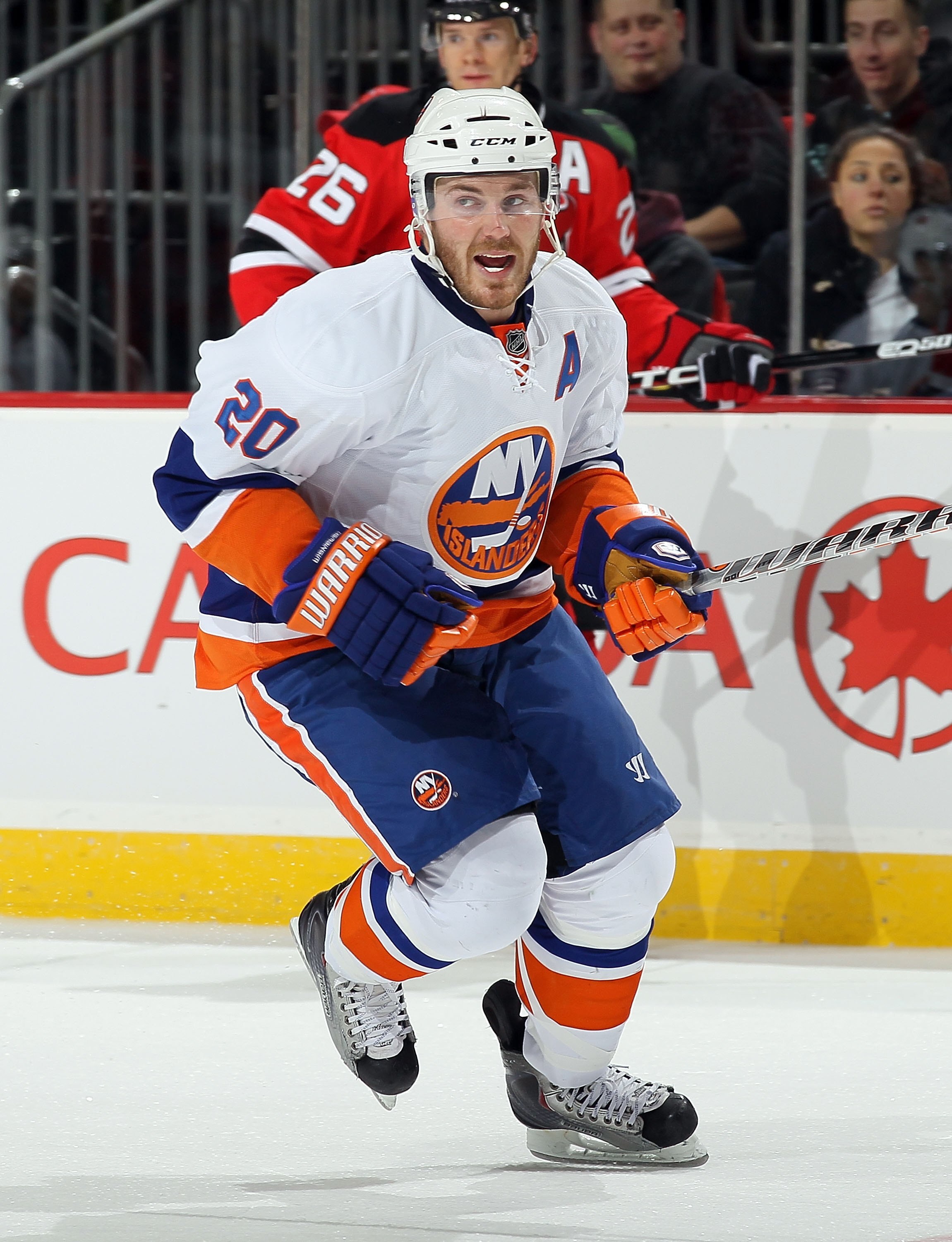 NEWARK, NJ - DECEMBER 23:  James Wisniewski #20 of the New York Islanders skates against the New Jersey Devils at the Prudential Center on December 23, 2010 in Newark, New Jersey. The Isles defeated the Devils 5-1.  (Photo by Jim McIsaac/Getty Images)