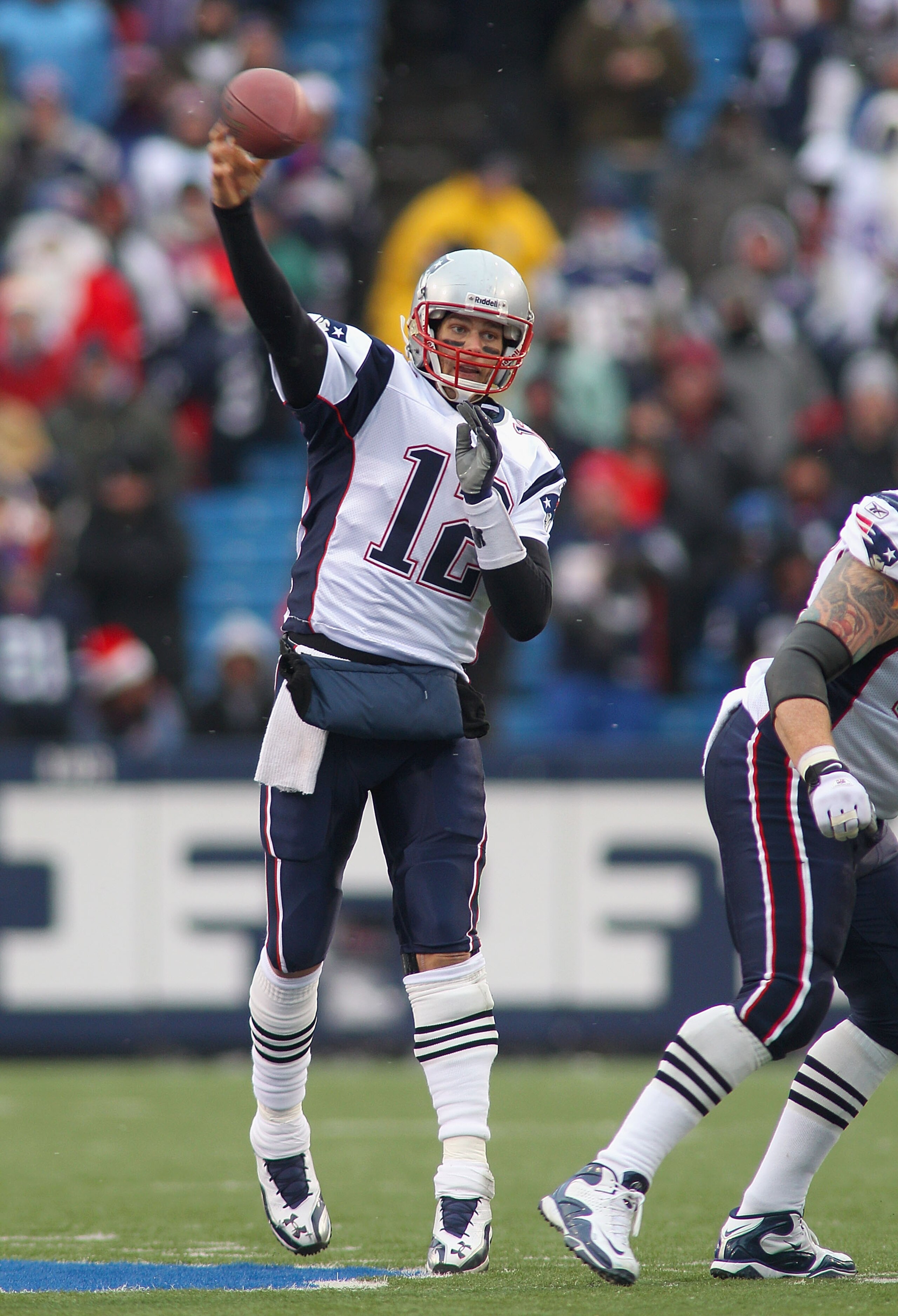 ORCHARD PARK, NY - DECEMBER 26: Tom Brady #12 of the New England Patriots throws a pass against the Buffalo Bills at Ralph Wilson Stadium on December 26, 2010 in Orchard Park, New York. New England won 34-3. (Photo by Rick Stewart/Getty Images) ORCHARD PARK, NY - DECEMBER 26: Tom Brady #12 of the New England Patriots throws a pass against the Buffalo Bills at Ralph Wilson Stadium on December 26, 2010 in Orchard Park, New York. New England won 34-3. (Photo by Rick Stewart/Getty Images)