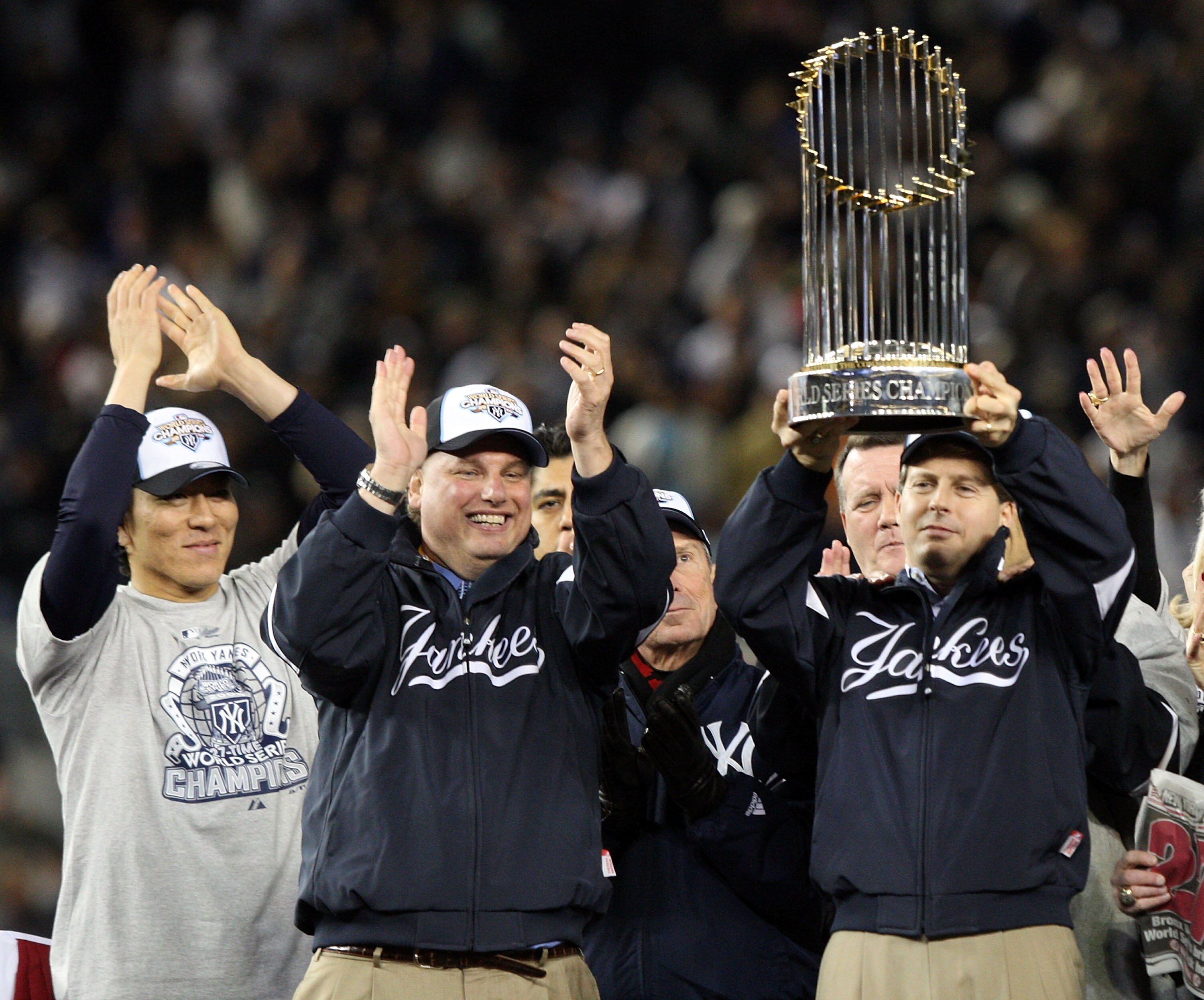 NEW YORK - NOVEMBER 04:  New York Yankees Managing General Partner Hal Steinbrenner of the New York Yankees celebrates with the trophy after their 7-3 win against the Philadelphia Phillies in Game Six of the 2009 MLB World Series at Yankee Stadium on Nove