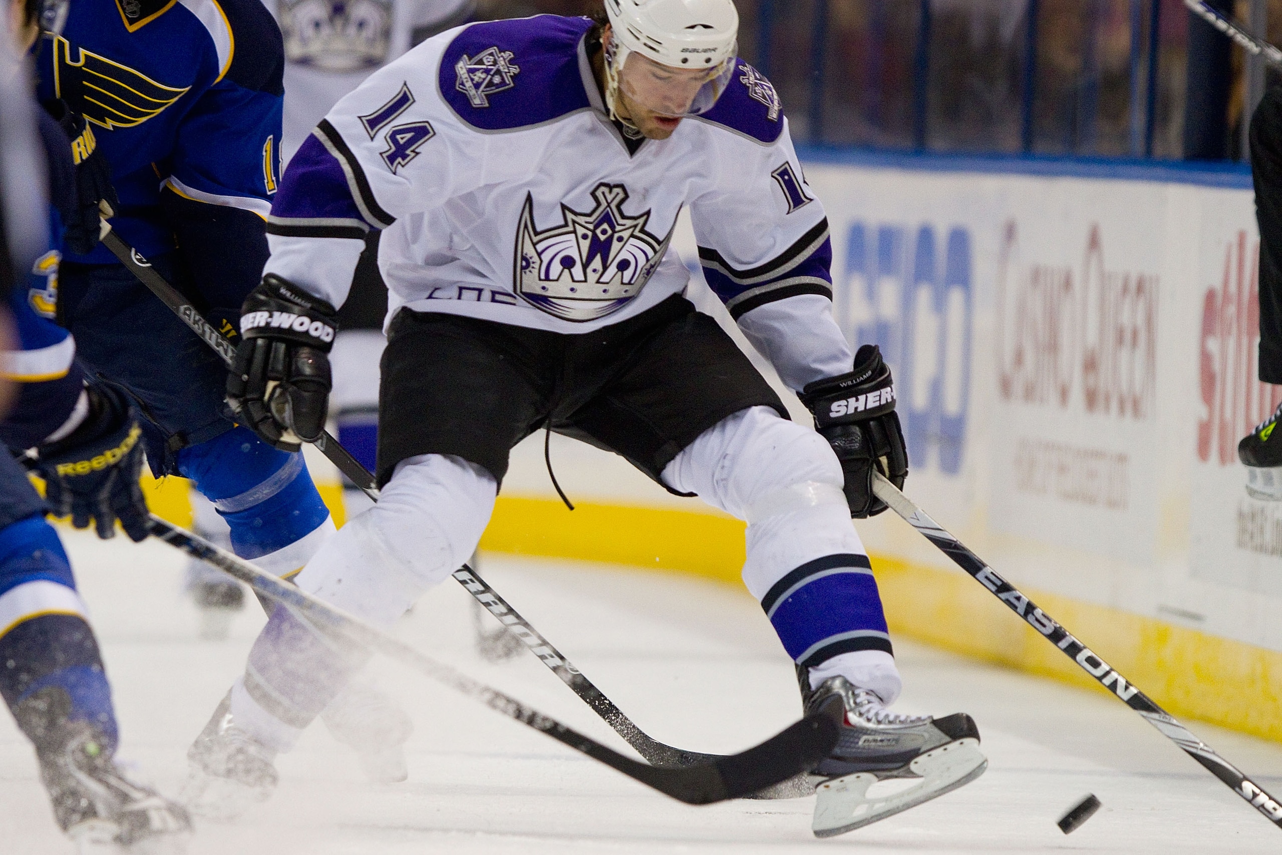 ST. LOUIS, MO - DECEMBER 16: Justin Williams #14 of the Los Angeles Kings looks to control the puck against the St. Louis Blues at the Scottrade Center on December 16, 2010 in St. Louis, Missouri. (Photo by Dilip Vishwanat/Getty Images) ST. LOUIS, MO - DECEMBER 16: Justin Williams #14 of the Los Angeles Kings looks to control the puck against the St. Louis Blues at the Scottrade Center on December 16, 2010 in St. Louis, Missouri. (Photo by Dilip Vishwanat/Getty Images)