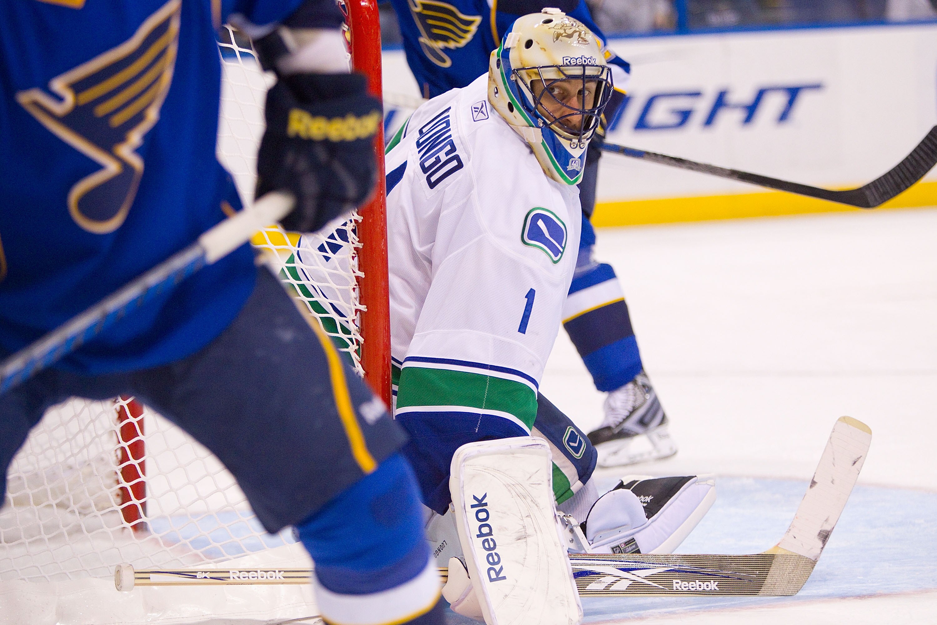 ST. LOUIS, MO - DECEMBER 20: Roberto Luongo #1 of the Vancouver Canucks looks to make a save against the St. Louis Blues at the Scottrade Center on December 20, 2010 in St. Louis, Missouri.  The Canucks beat the Blues 3-1.  (Photo by Dilip Vishwanat/Getty