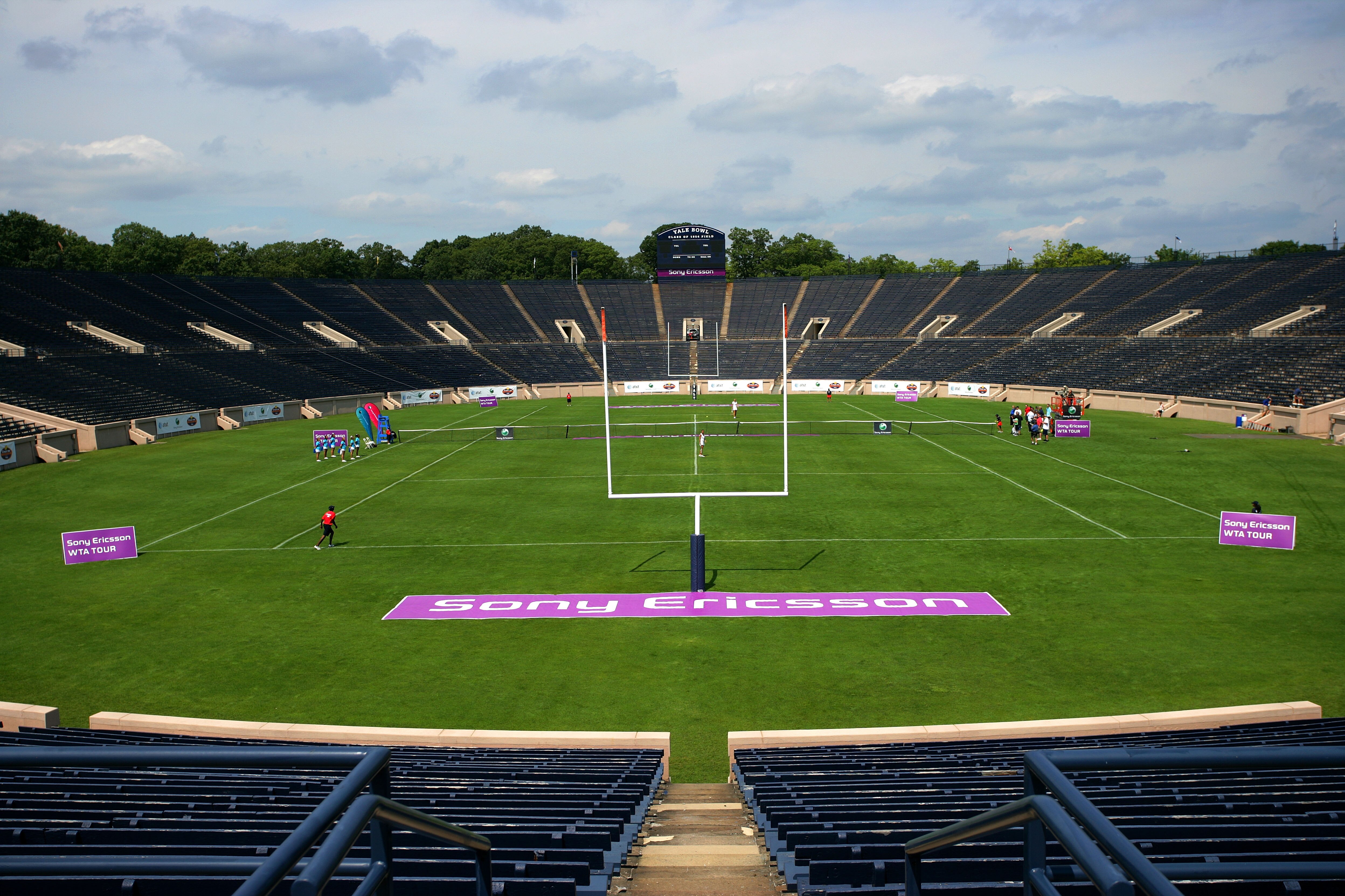 NEW HAVEN, CT - AUGUST 24:  Flavia Pennetta of Italy and Caroline Wozniacki of Denmark play in a staged tennis exhibition on an oversized tennis court at the Yale Bowl on August 24, 2009 in New Haven, Connecticut.  (Photo by Chris Trotman/Getty Images for