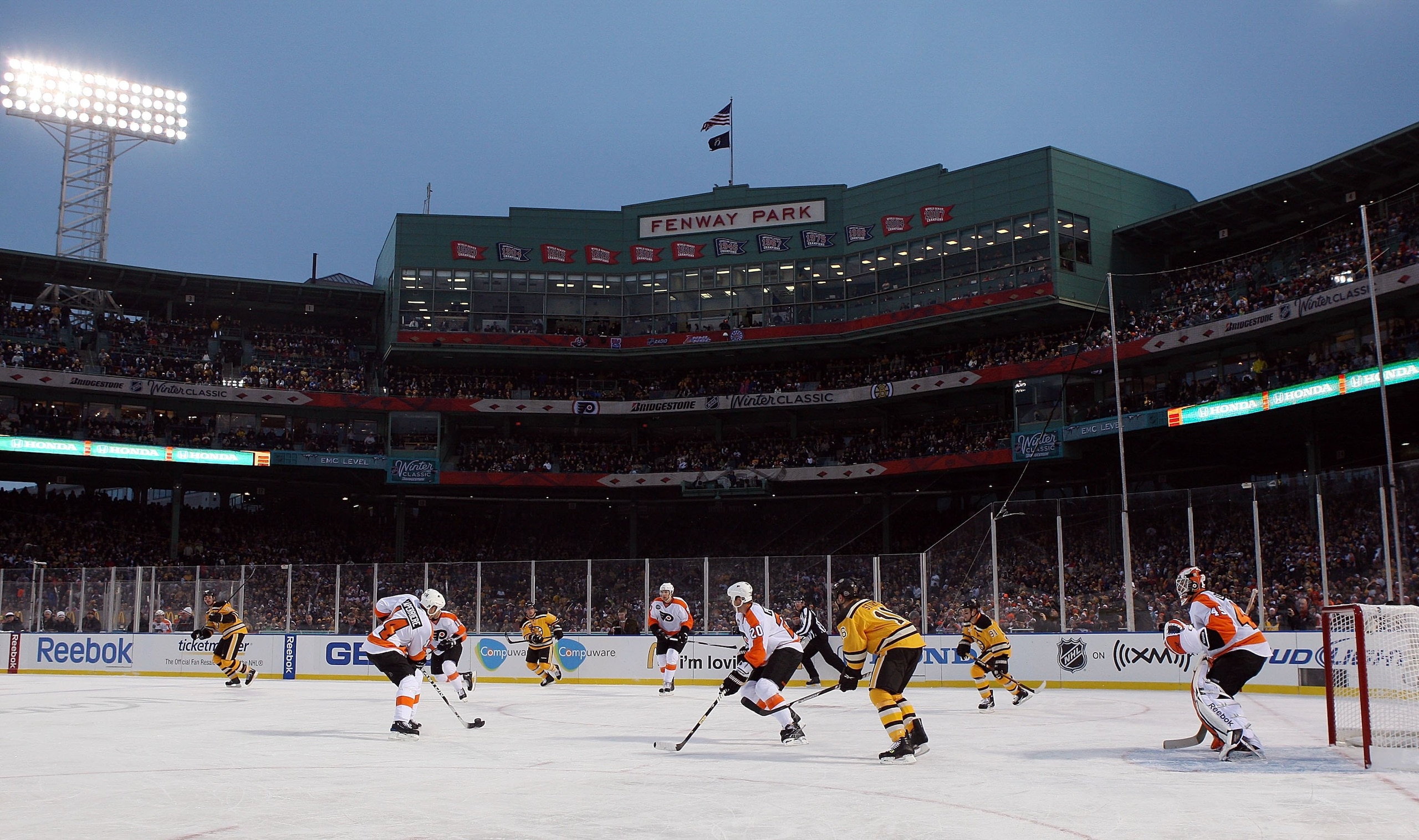 BOSTON, MA - JANUARY 01:  The Philadelphia Flyers skate against the Boston Bruins during the 2010 Bridgestone Winter Classic at Fenway Park on January 1, 2010  in Boston, Massachusetts.  (Photo by Jim McIsaac/Getty Images)
