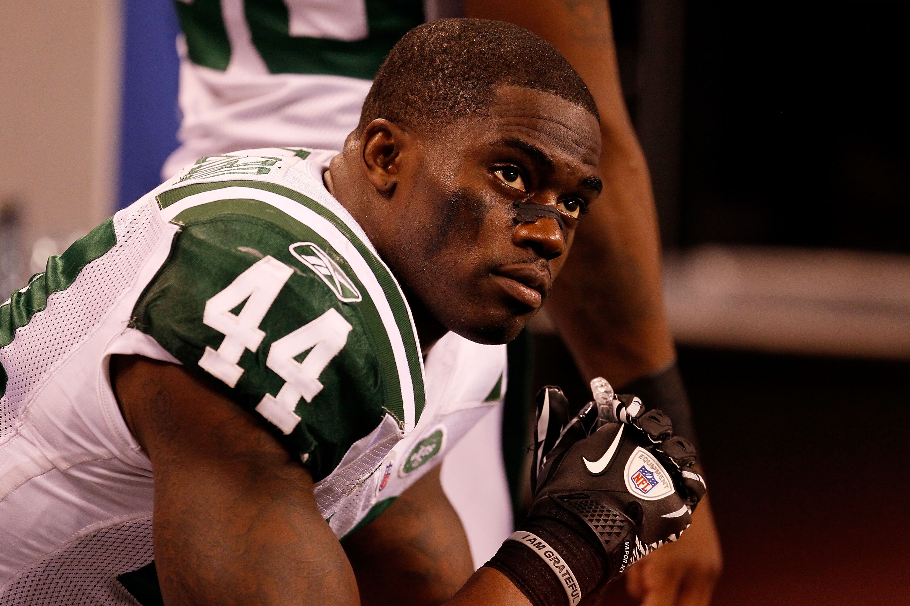 INDIANAPOLIS - JANUARY 24:  James Ihedigbo #44 of the New York Jets looks on from the sidelines during the fourth quarter of the game against the Indianapolis Colts during the AFC Championship Game at Lucas Oil Stadium on January 24, 2010 in Indianapolis,
