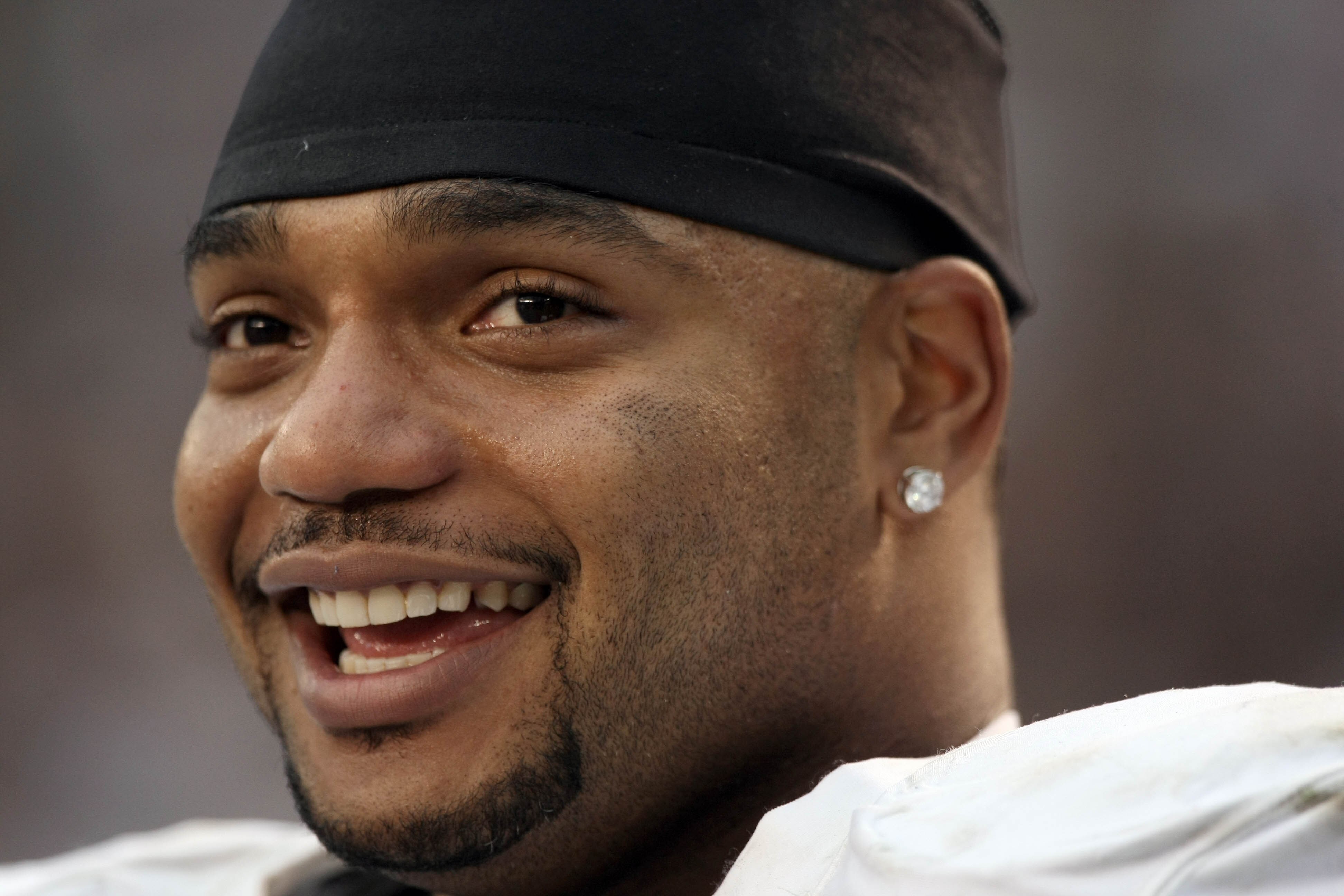 SAN DIEGO, CA - DECEMBER 5: Richard Seymour #92 of the Oakland Raiders smiles from the sidelines in the closing minutes of his team's 28-13 win over the San Diego Chargers during their NFL game at Qualcomm Stadium on December 5, 2010 in San Diego, Califor