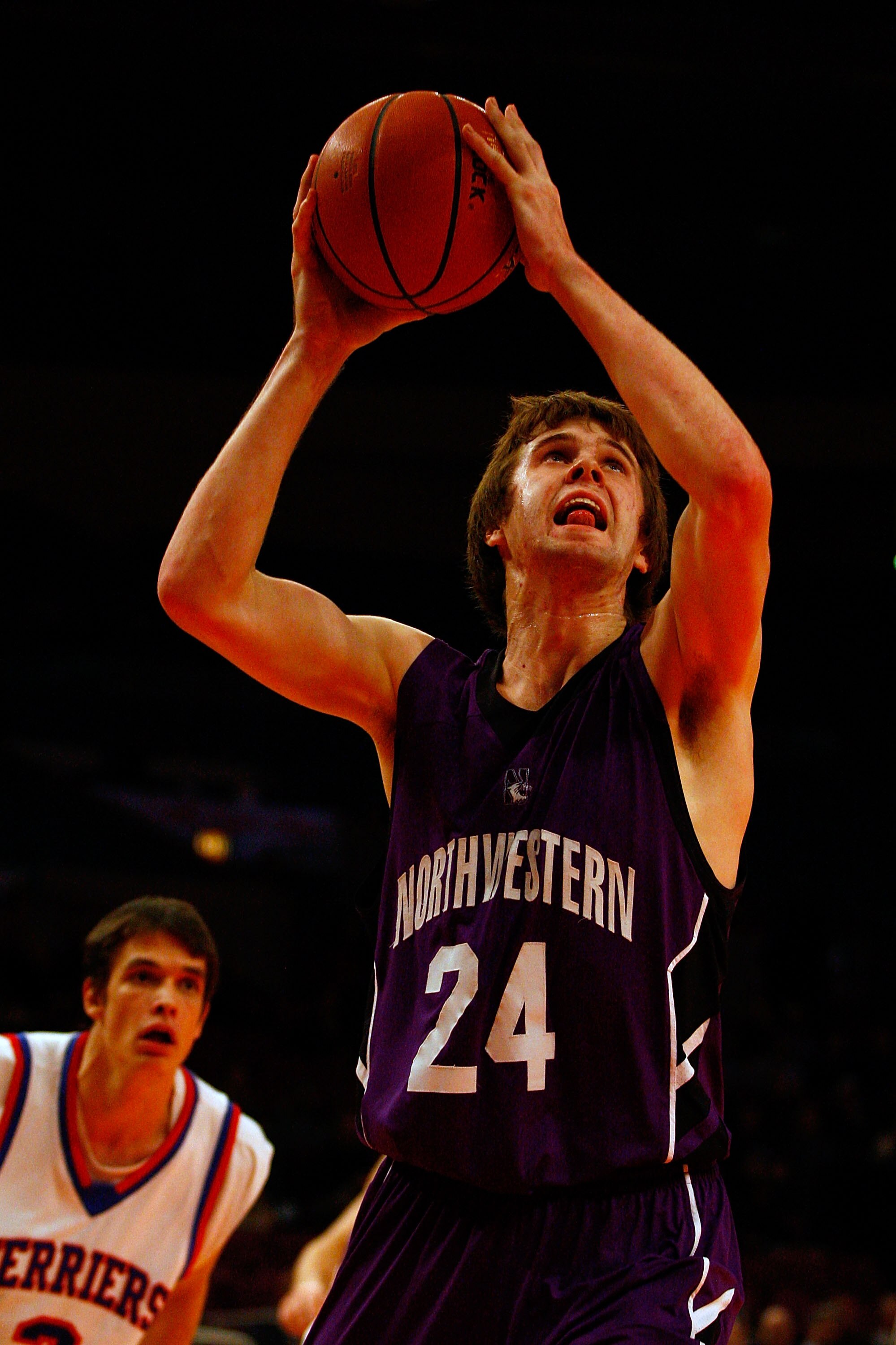 NEW YORK, NY - DECEMBER 20:  John Shurna #24 of the Northwestern Wildcats goes up for a shot attempt against the St. Francis Terriers during the Madison Square Garden Holiday Festival at Madison Square Garden on December 20, 2010 in New York City.  (Photo