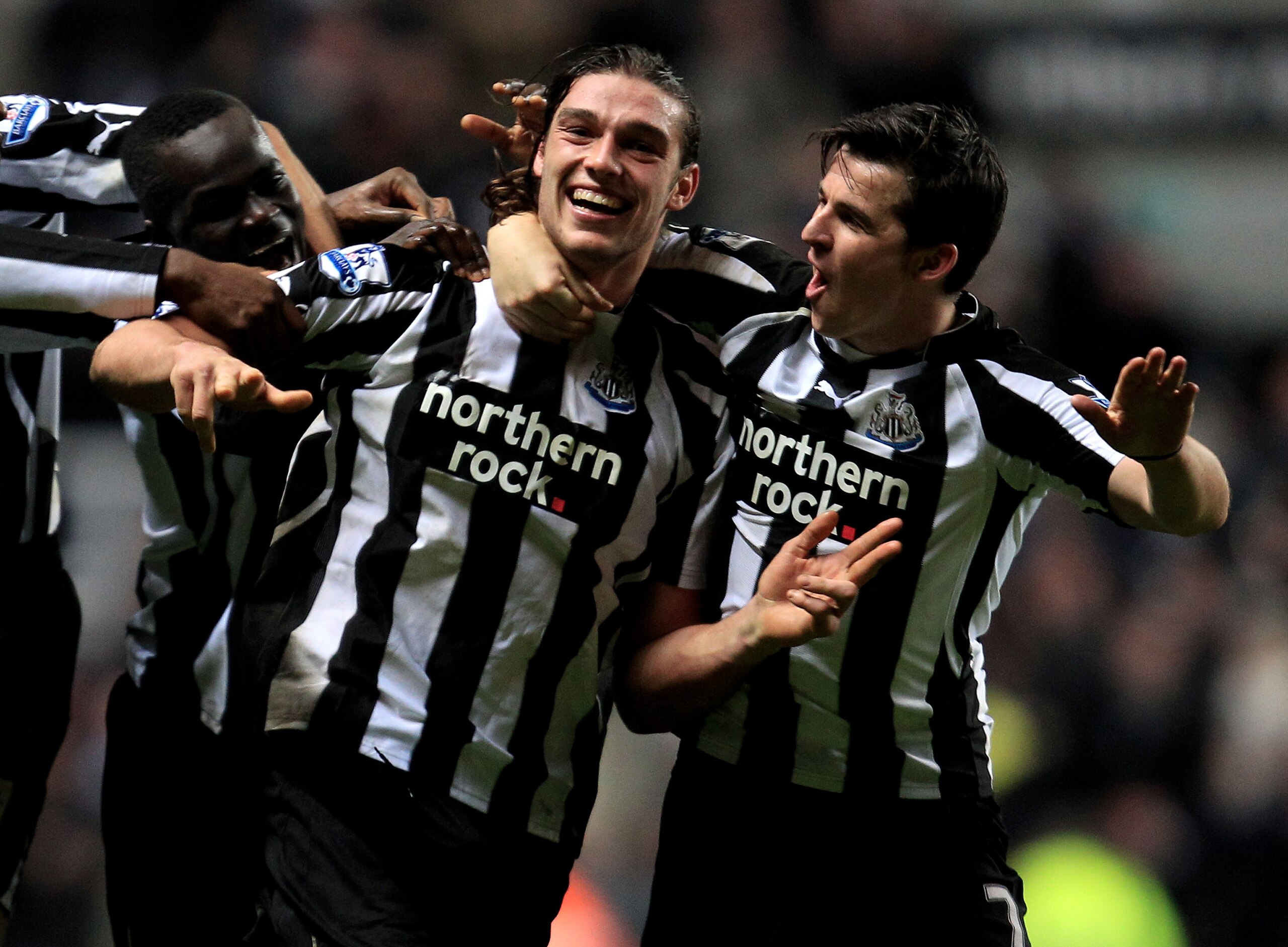 NEWCASTLE, UNITED KINGDOM - DECEMBER 11:  Andy Carroll of Newcastle United celebrates scoring his team's third goal with team mate Joey Barton (R) during the Barclays Premier League match between Newcastle United and Liverpool at St James' Park on Decembe