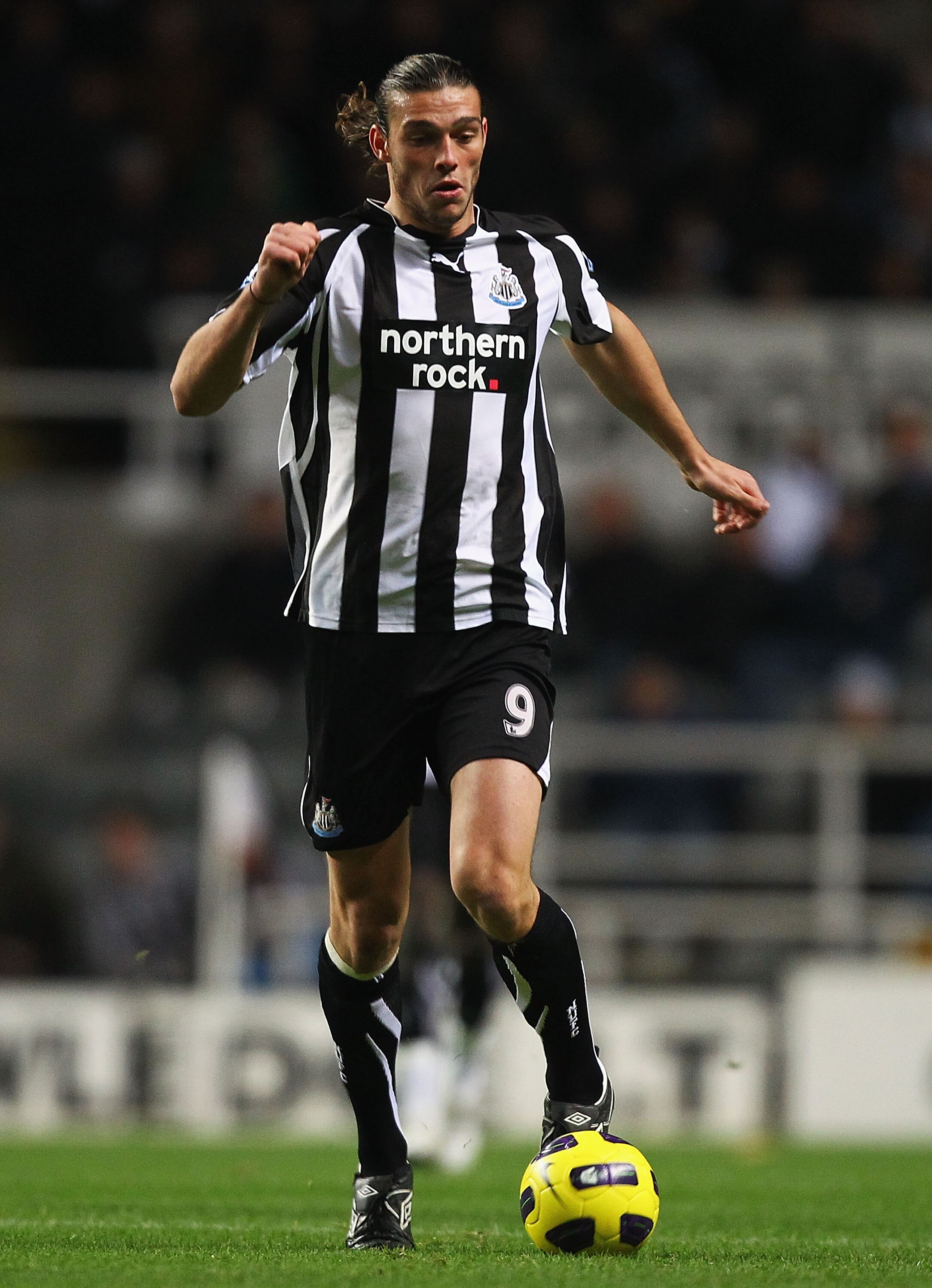 NEWCASTLE UPON TYNE, ENGLAND - NOVEMBER 10:  Andy Carroll of Newcastle United ini action during the Barclays Premier League match between Newcastle United and Blackburn Rovers at St James' Park on November 10, 2010 in Newcastle upon Tyne, England.  (Photo