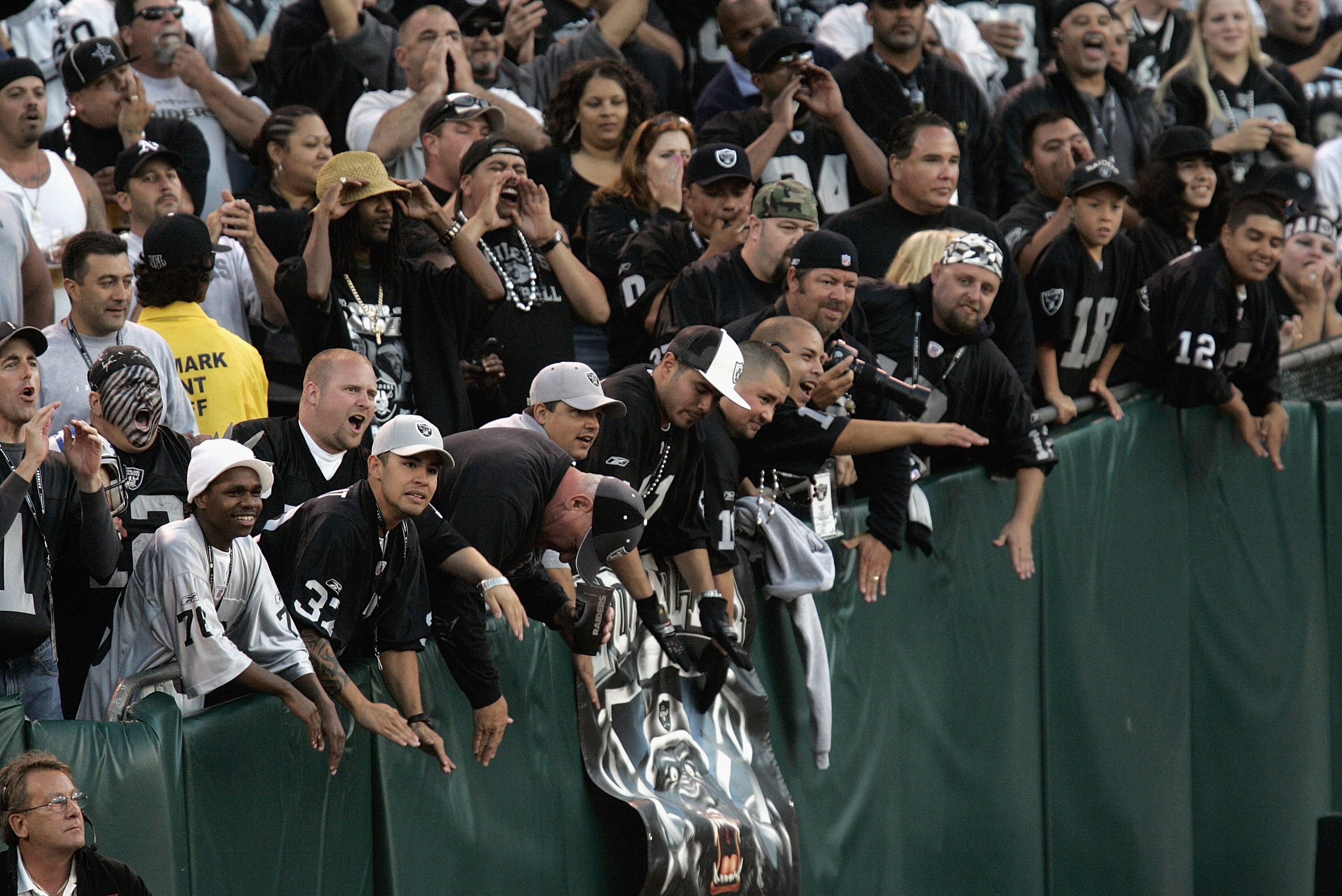 OAKLAND, CA - AUGUST 25: The Raider Nation in the famous black hole cheer on their Oakland Raiders as the Oakland Raiders host the Detroit Lions at McAfee Stadium on August 25, 2006 in Oakland, California. (Photo by David Paul Morris /Getty Images)