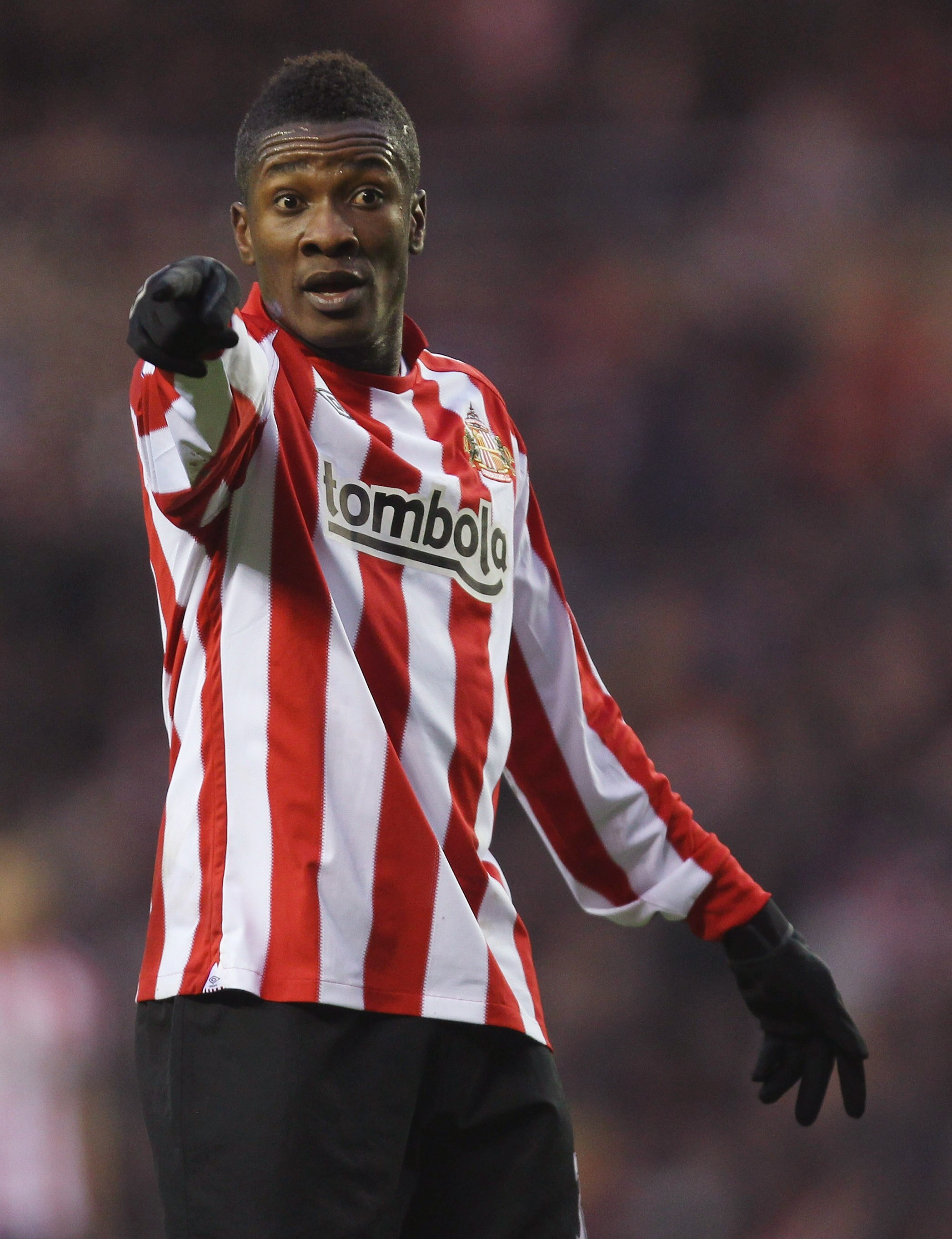 SUNDERLAND, ENGLAND - DECEMBER 28:  Asamoah Gyan of Sunderland looks on during the Barclays Premier League match between Sunderland and Blackpool at the Stadium of Light on December 28, 2010 in Sunderland, England.  (Photo by Ian Walton/Getty Images)