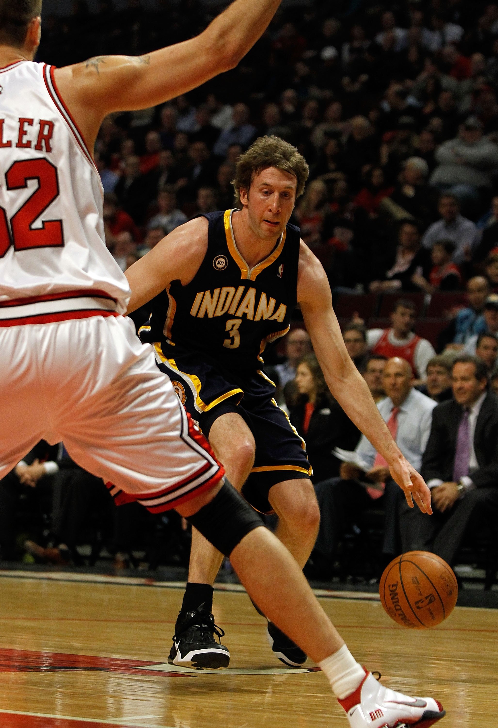 CHICAGO - FEBRUARY 24: Troy Murphy #3 of the Indiana Pacers moves against Brad Miller #52 of the Chicago Bulls at the United Center on February 24, 2010 in Chicago, Illinois. The Bulls defeated the Pacers 120-110. NOTE TO USER: User expressly acknowledges