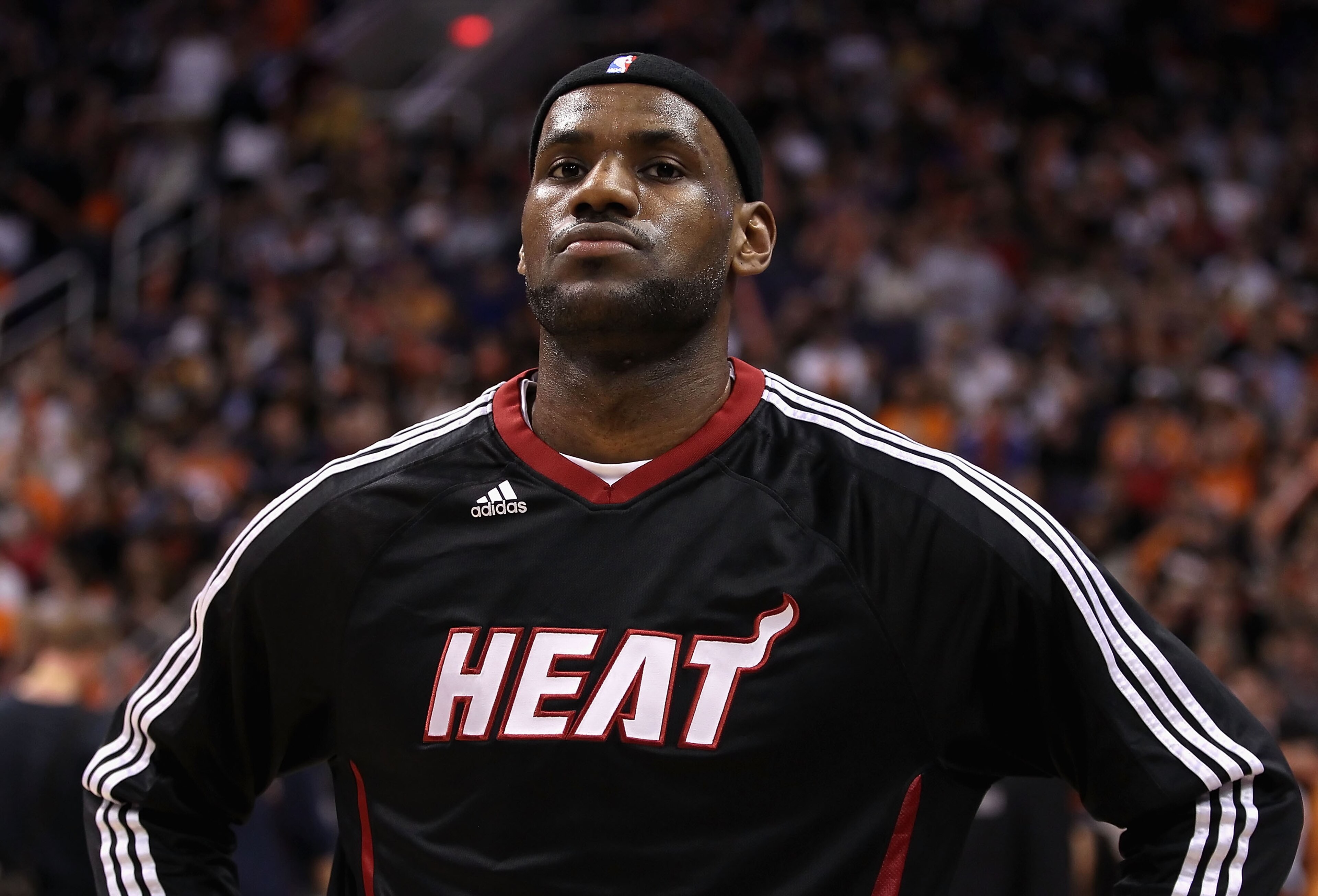 PHOENIX - DECEMBER 23:  LeBron James #6 of the Miami Heat stands attended for the National Anthem before the NBA game against the Phoenix Suns at US Airways Center on December 23, 2010 in Phoenix, Arizona. NOTE TO USER: User expressly acknowledges and agr