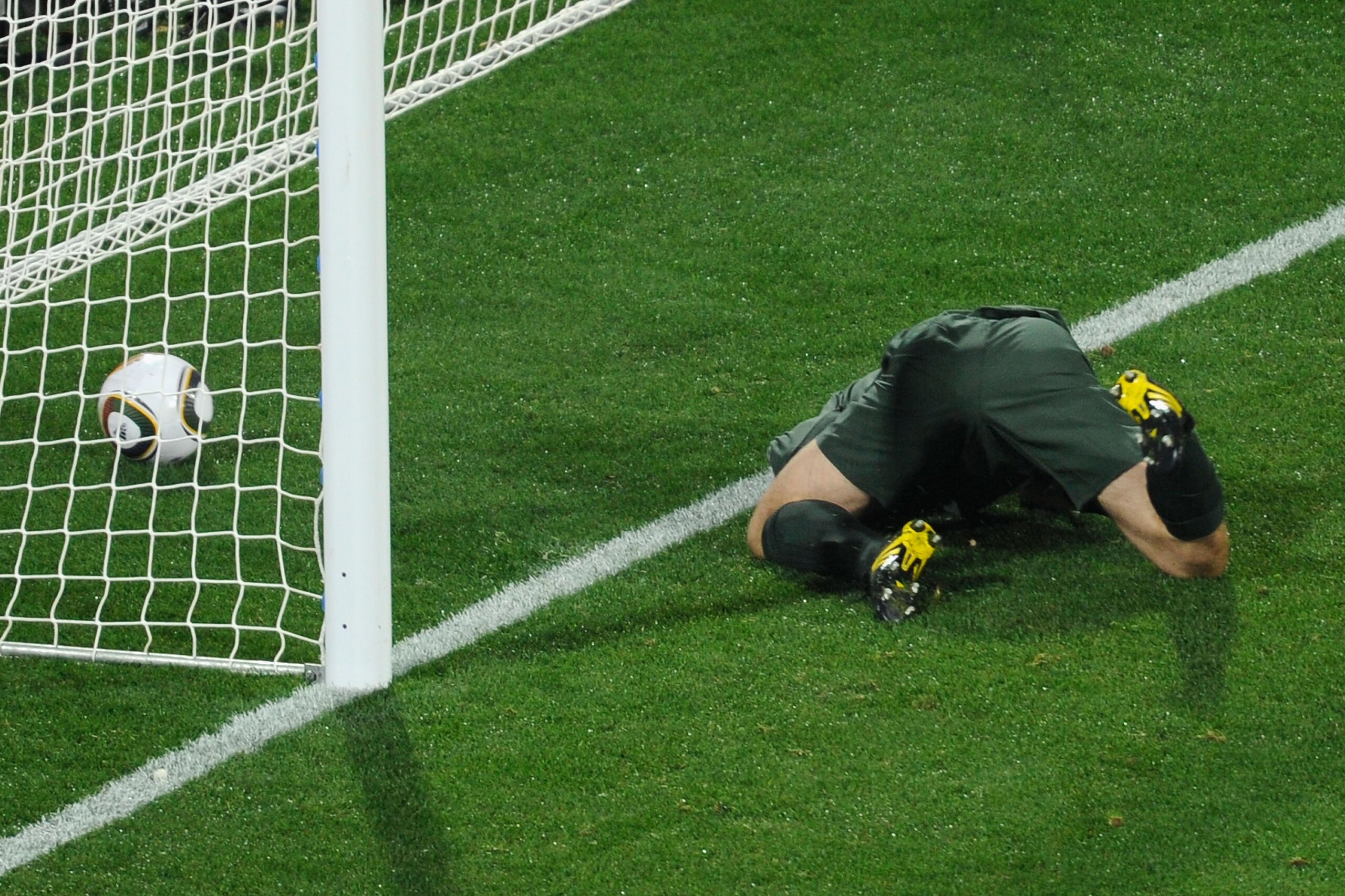 RUSTENBURG, SOUTH AFRICA - JUNE 12:  Robert Green of England misjudges the ball and lets in a goal during the 2010 FIFA World Cup South Africa Group C match between England and USA at the Royal Bafokeng Stadium on June 12, 2010 in Rustenburg, South Africa