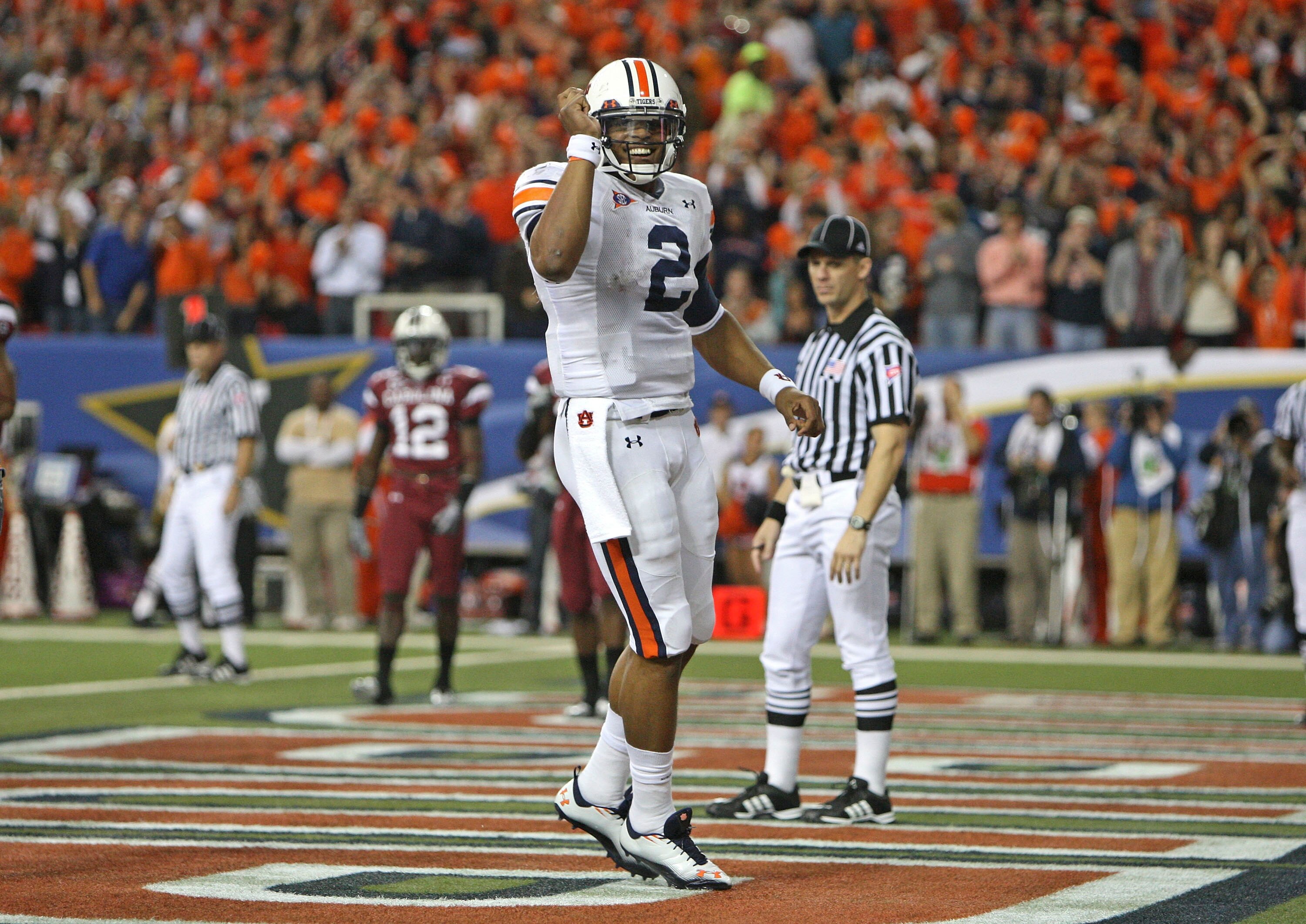 ATLANTA - DECEMBER 04:  Quarterback Cam Newton #2 of the Auburn Tigers celebrates after a touchdown during the 2010 SEC Championship against the South Carolina Gamecocks at Georgia Dome on December 4, 2010 in Atlanta, Georgia.  (Photo by Mike Zarrilli/Get