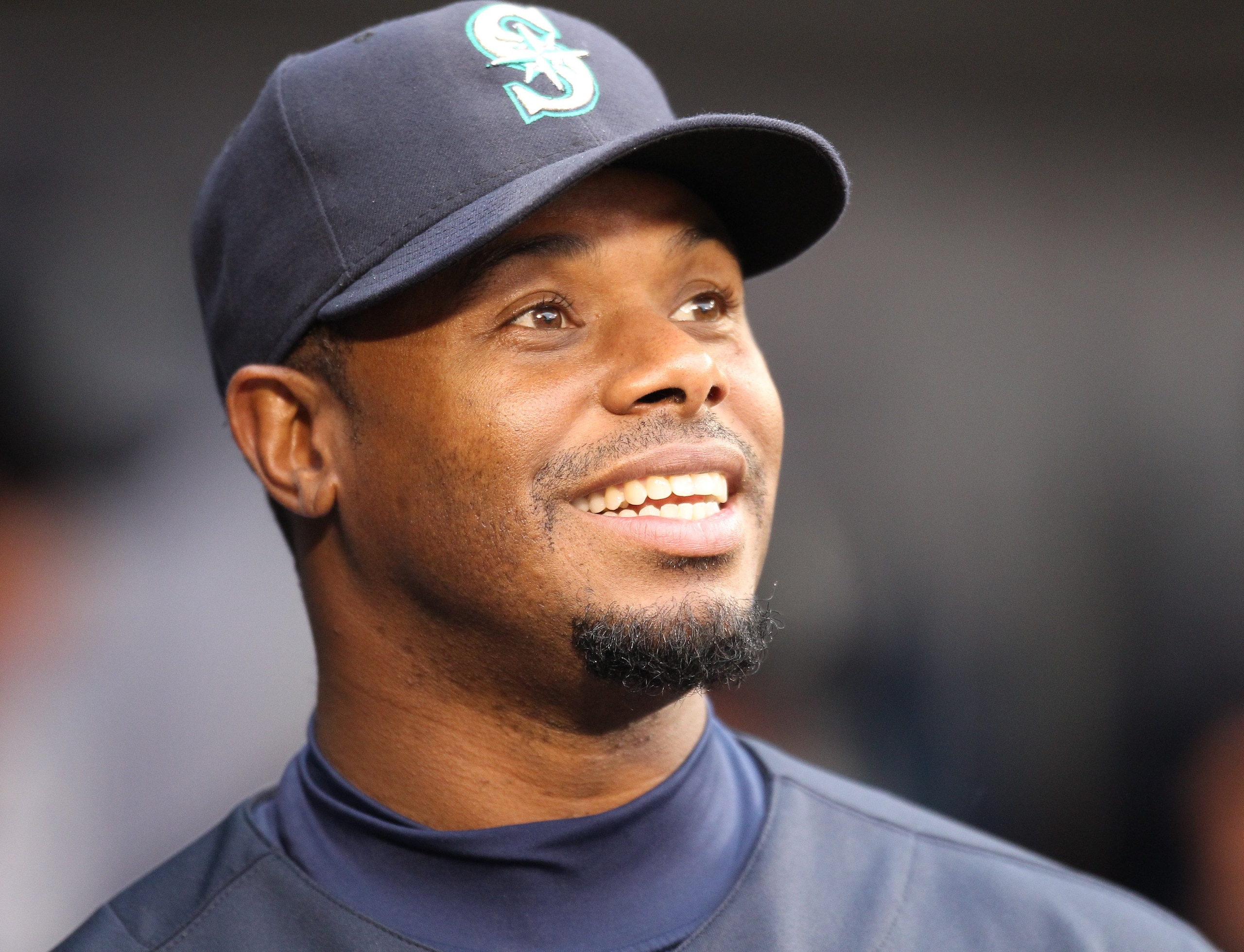 SEATTLE - APRIL 30:  Ken Griffey Jr. #24 of the Seattle Mariners smiles in the dugout prior to the game against the Texas Rangers at Safeco Field on April 30, 2010 in Seattle, Washington. (Photo by Otto Greule Jr/Getty Images)