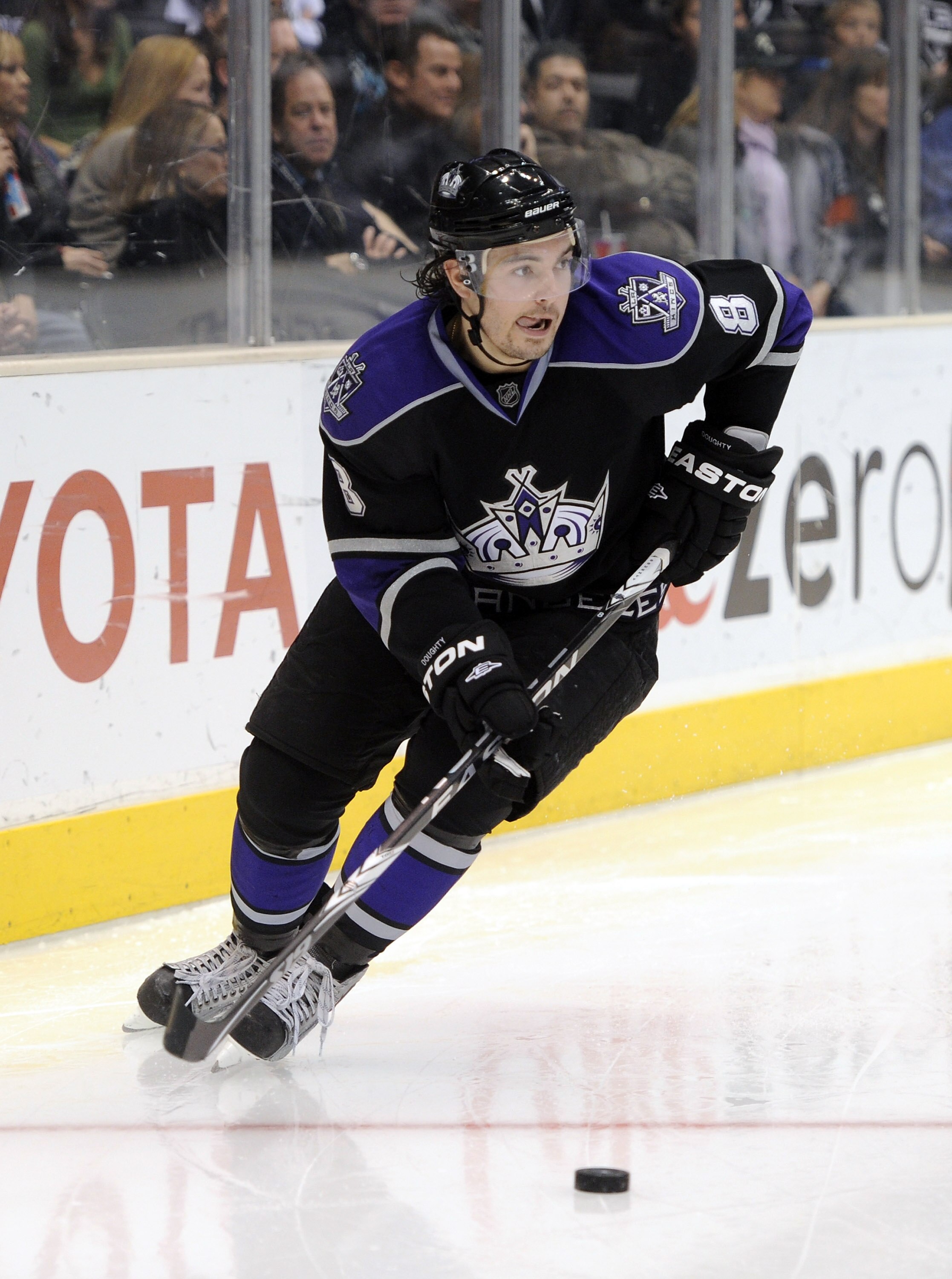 LOS ANGELES, CA - DECEMBER 11:  Drew Doughty #8 of the Los Angeles Kings starts a rush against the Minnesota Wild during the game at the Staples Center on December 11, 2010 in Los Angeles, California.  (Photo by Harry How/Getty Images)