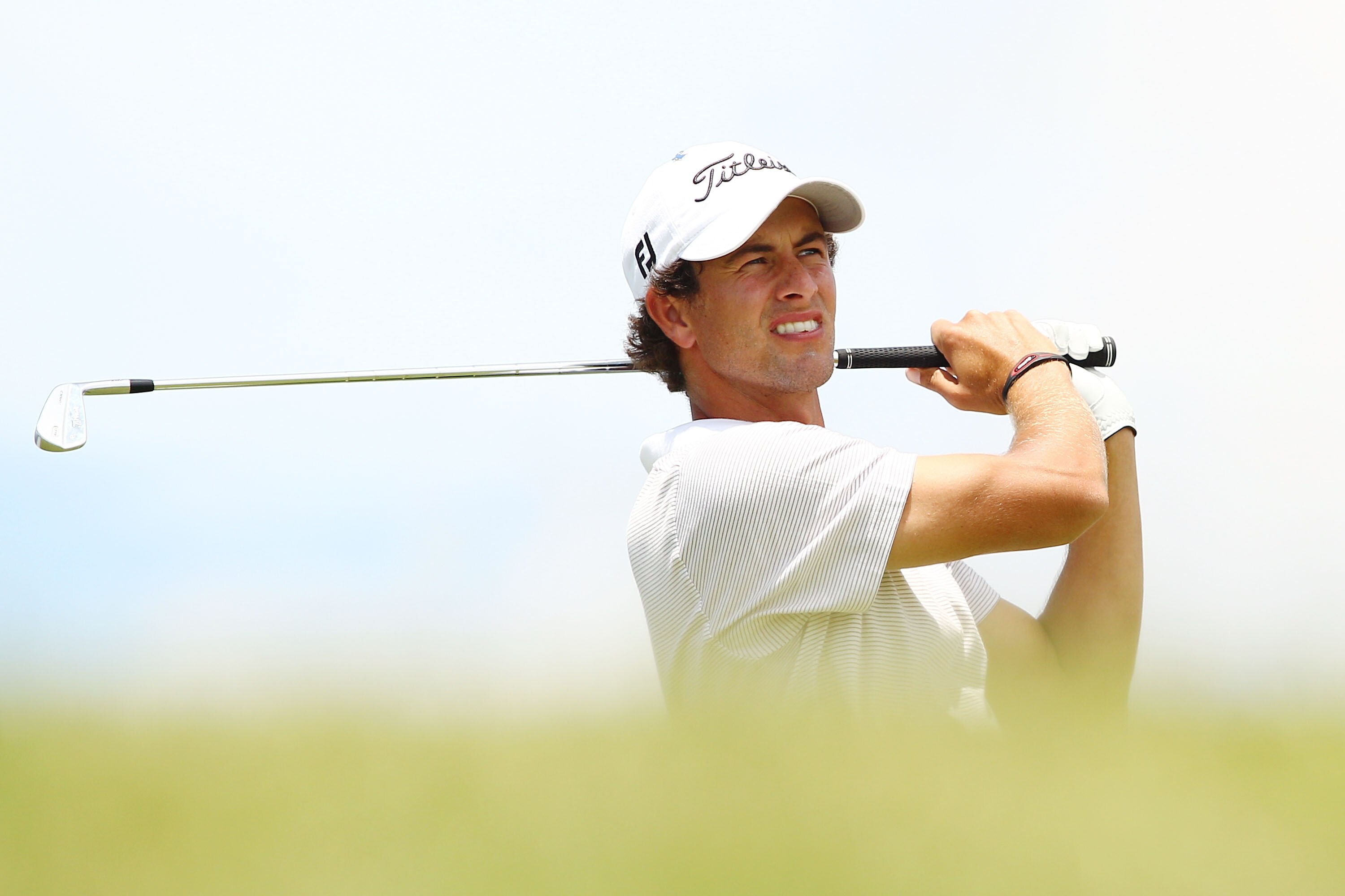 SYDNEY, AUSTRALIA - DECEMBER 05:  Adam Scott of Australia plays a shot on the 17th hole during day four of the Australian Open at The Lakes Golf Club on December 5, 2010 in Sydney, Australia.  (Photo by Brendon Thorne/Getty Images)
