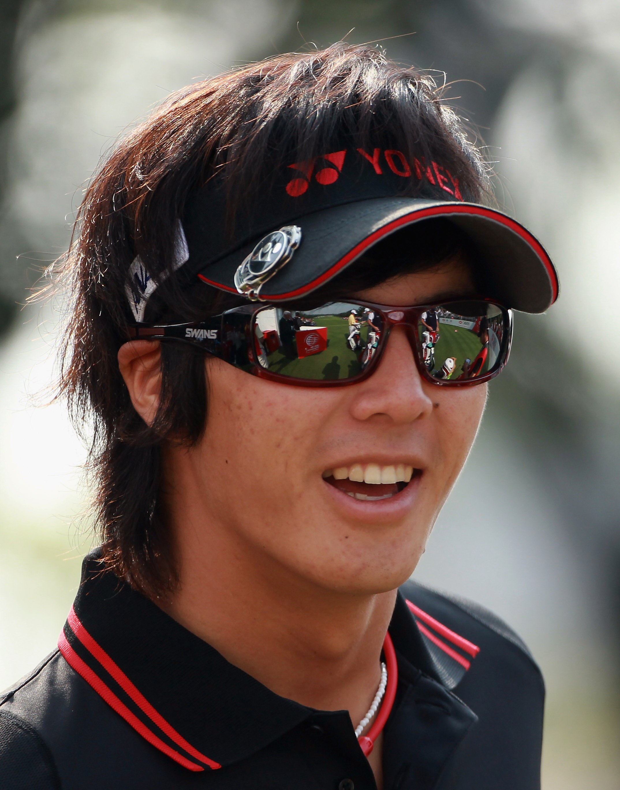 SHANGHAI, CHINA - NOVEMBER 05:  Ryo Ishikawa of Japan waits on the first hole during the second round of the WGC-HSBC Champions at Sheshan International Golf Club on November 5, 2010 in Shanghai, China.  (Photo by Andrew Redington/Getty Images)
