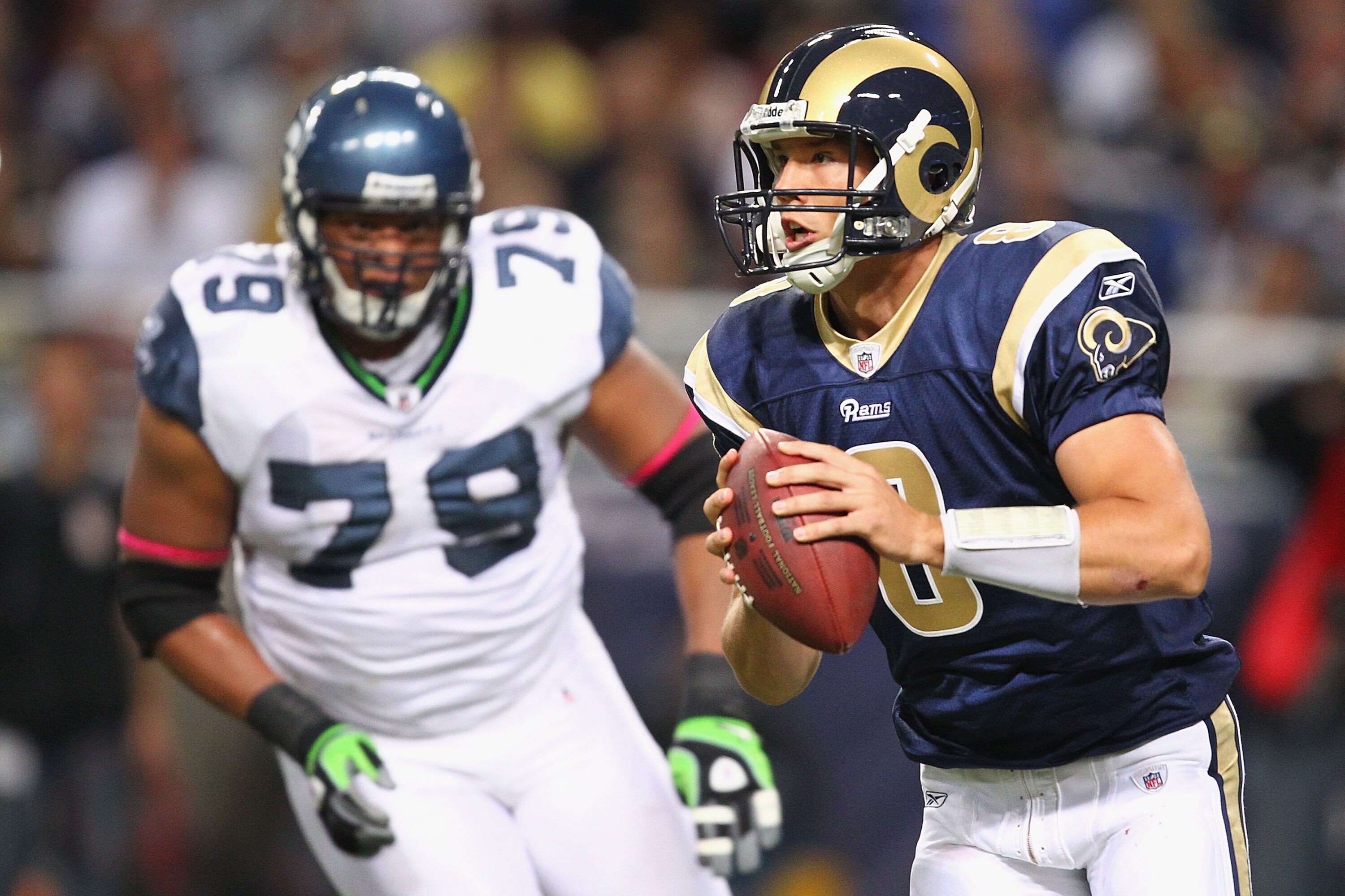 ST. LOUIS - OCTOBER 3: Sam Bradford #8 of the St. Louis Rams scrambles against the Seattle Seahawks at the Edward Jones Dome on October 3, 2010 in St. Louis, Missouri.  The Rams beat the Seahawks 20-3.  (Photo by Dilip Vishwanat/Getty Images)