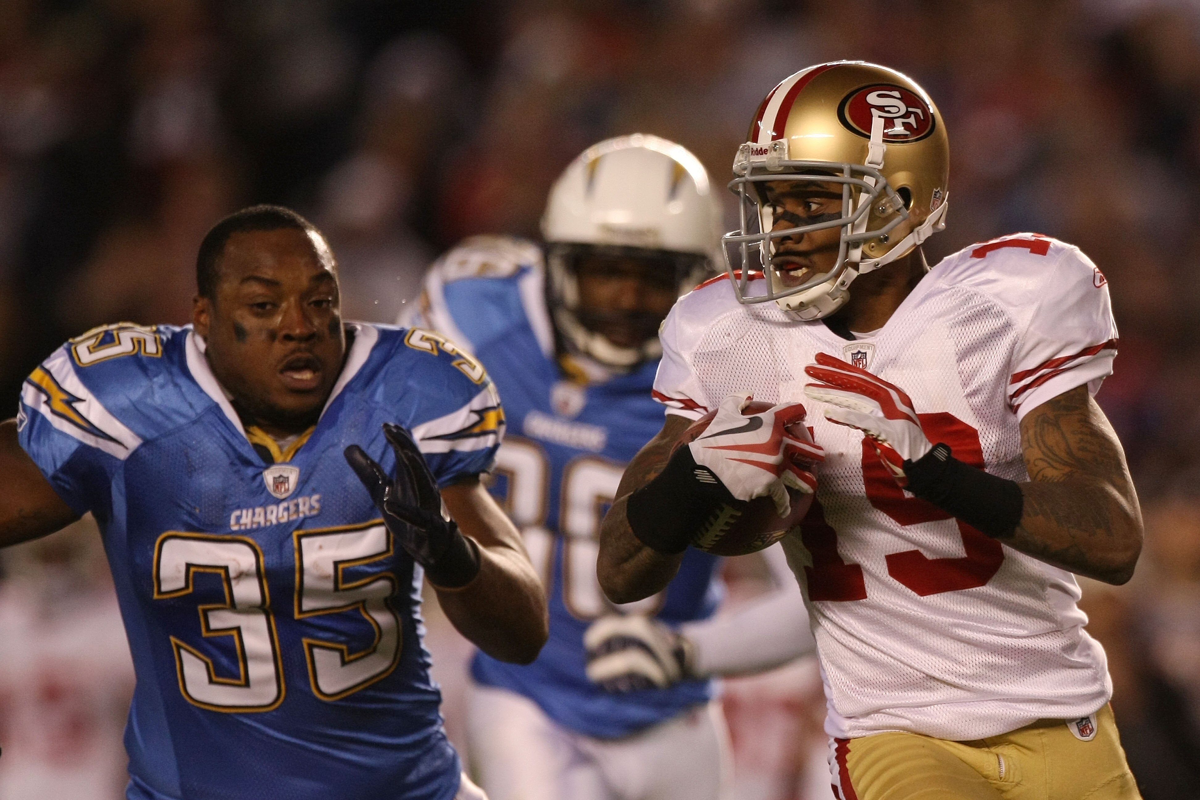 SAN DIEGO, CA - DECEMBER 16:  Running back Mike Tolbert #35 of the San Diego Chargers chases after Ted Ginn #19 of the San Francisco 49ers during a punt return at Qualcomm Stadium on December 16, 2010 in San Diego, California.  (Photo by Donald Miralle/Ge