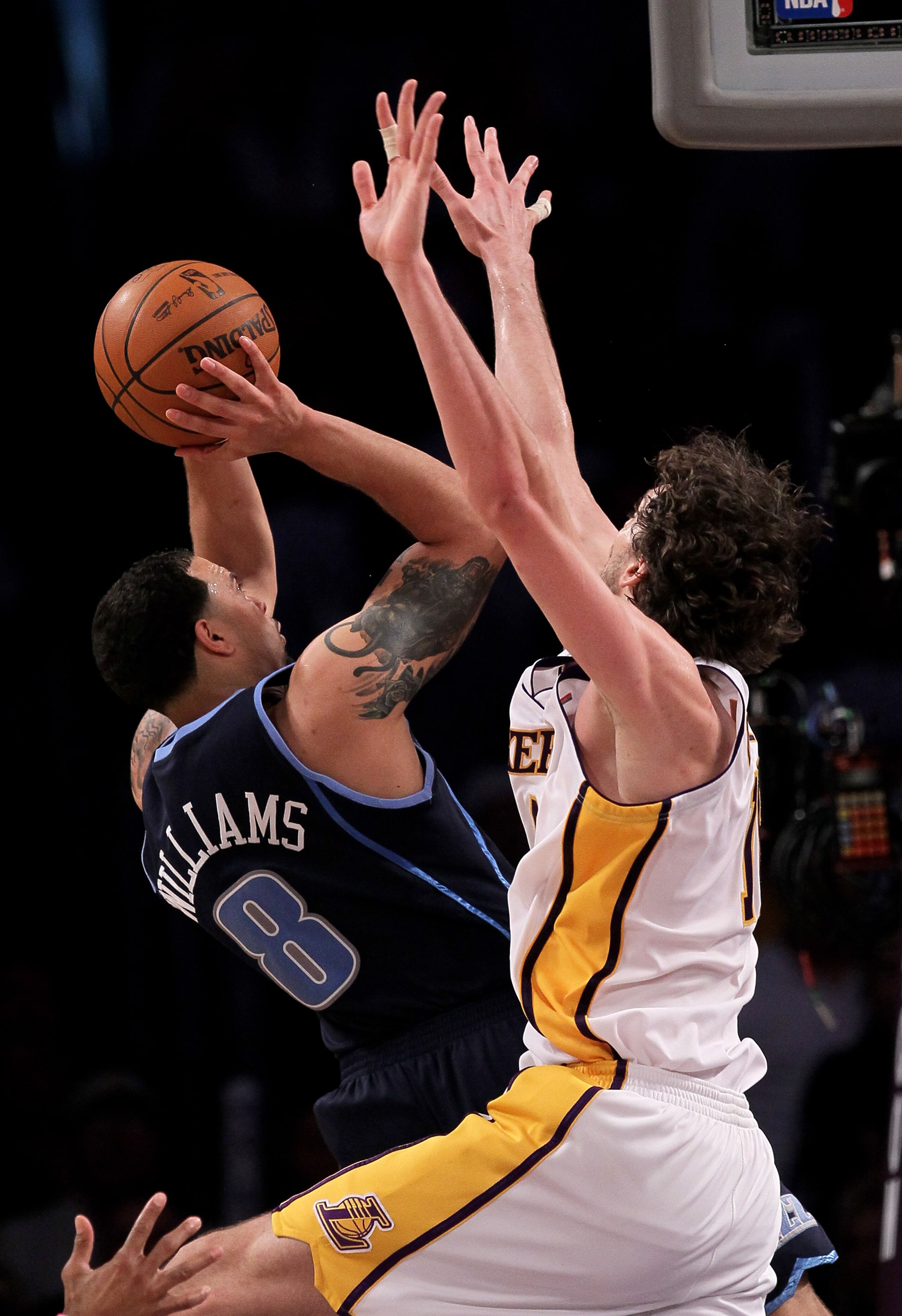 LOS ANGELES, CA - MAY 02:  Deron Williams #8 of the Utah Jazz shoots against Pau Gasol #16 of the Los Angeles Lakers during Game One of the Western Conference Semifinals of the 2010 NBA Playoffs on May 2, 2010 at Staples Center in Los Angeles, California.