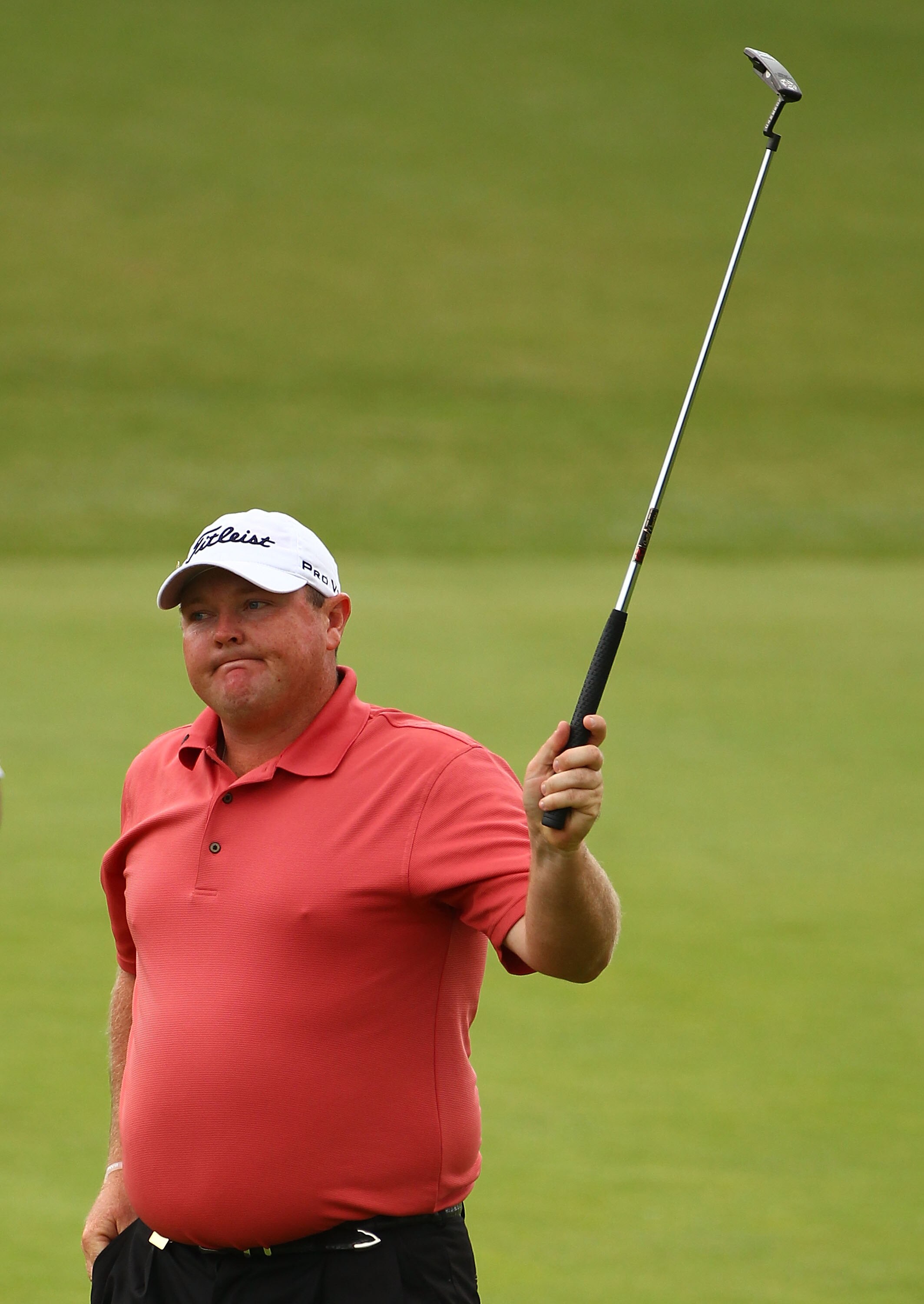 MELBOURNE, AUSTRALIA - NOVEMBER 14:  Jarrod Lyle of Australia acknowledges the crowd after finishing his round on the 18th during day four of the Australian Masters at The Victoria Golf Club on November 14, 2010 in Melbourne, Australia.  (Photo by Robert